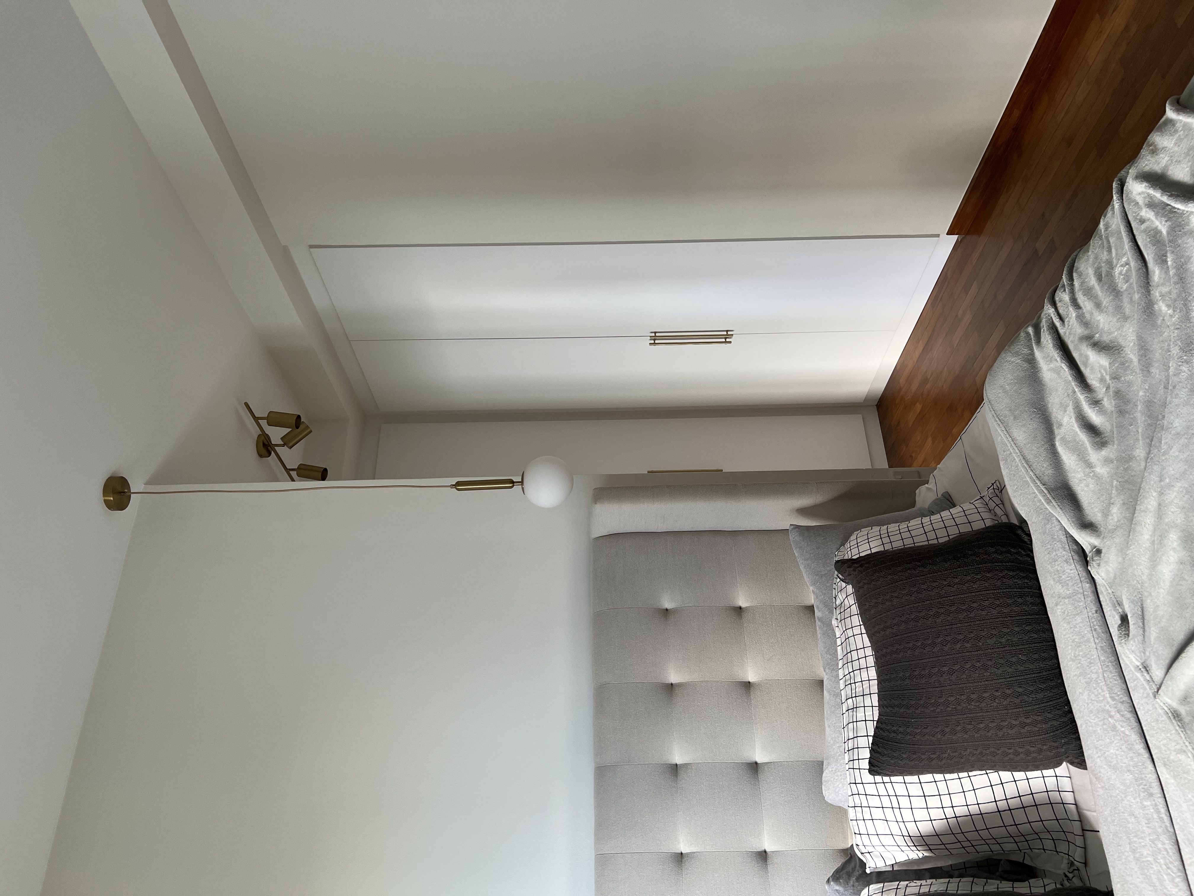 Sleek Comfort For A Good Night Rest - modern bedroom, minimalist design, cozy atmosphere, white walls, wooden ceiling, soft