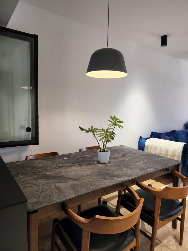 Simplicity accentuates my dining space - modern dining room, minimalist design, wooden dining table, black pendant light