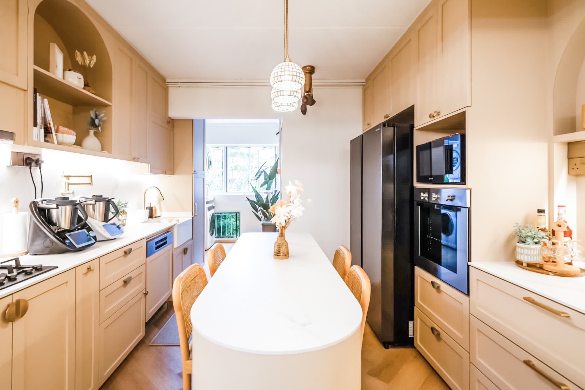 Kitchen is the soul of our home! - Modern kitchen with beige cabinets, white countertop, built-in appliances, dining table