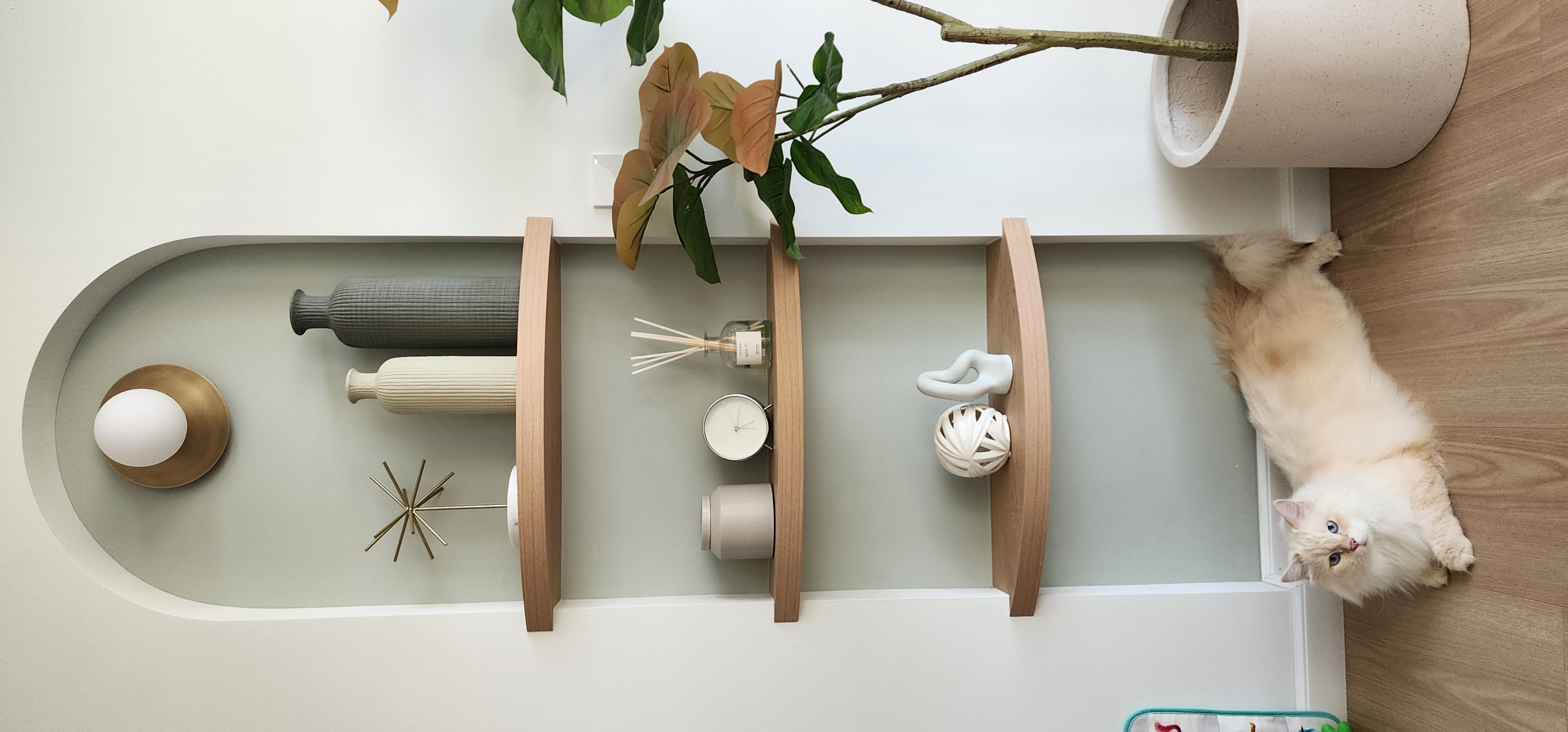 Building a pet friendly Scandinavian home - modern minimalist decor, cozy room ambiance, floating shelf, wooden frame, white