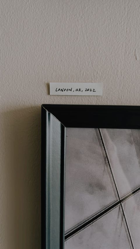 Christmas fiesta in our living room - "London, UK, 2022", "Black and white photograph", "Minimalist interior design", "Modern