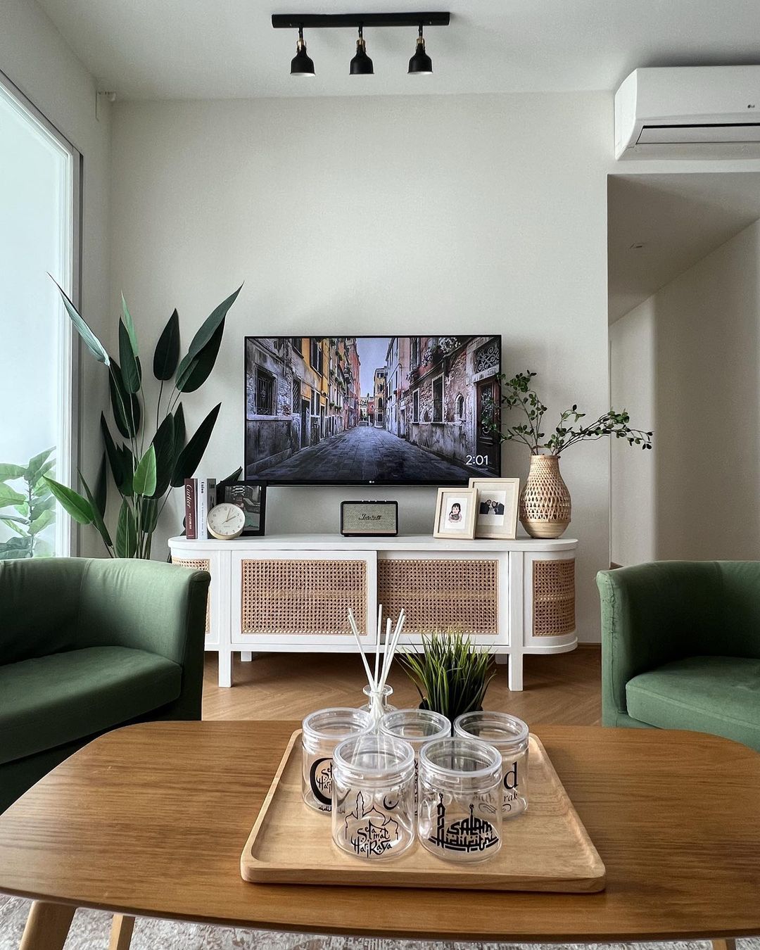 Home isn't a place, it's a feeling - Modern living room, cozy ambiance, minimalist decor, large window, green furniture