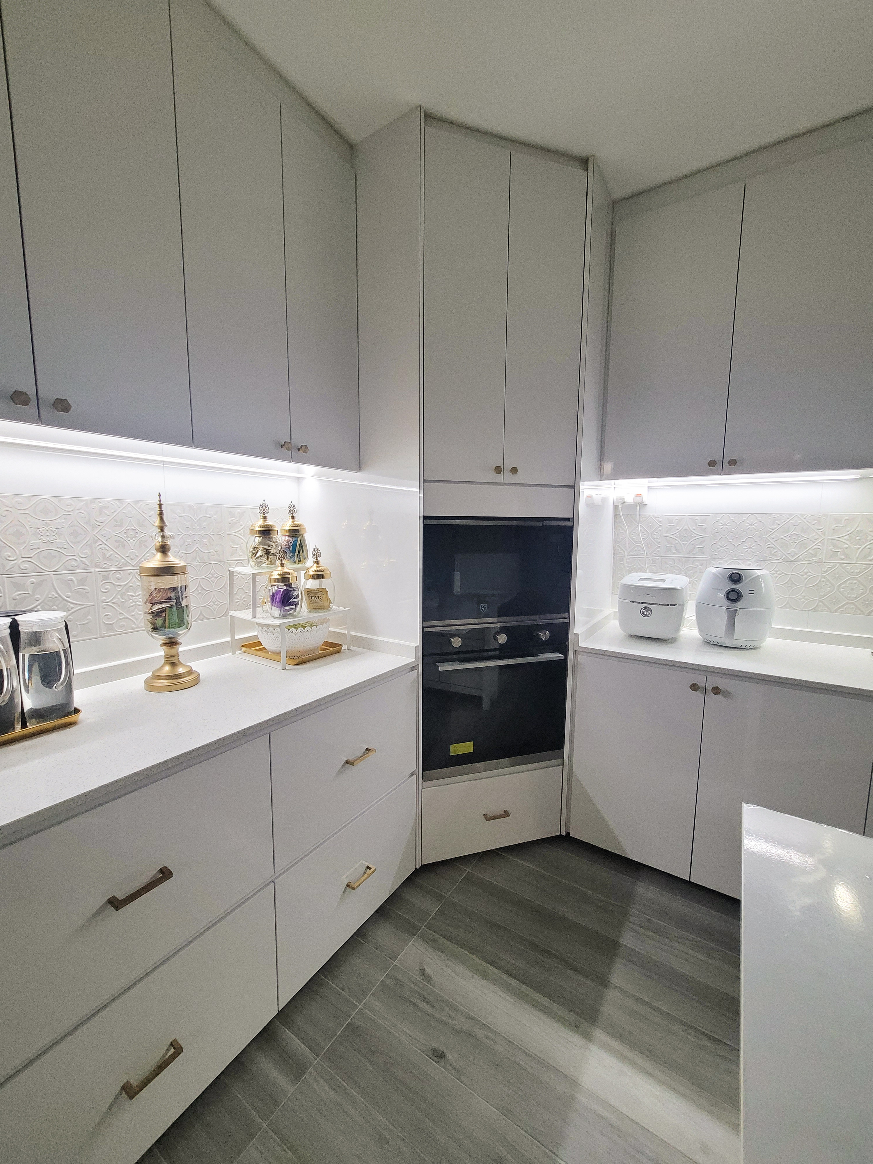 Understated white Moroccan vibes - White kitchen cabinetry, modern design, sleek countertops, minimalist decor, elegant jars