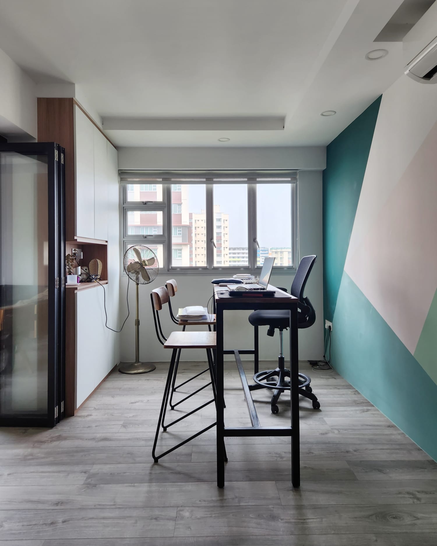 A versatile, multi-purpose home office - study space - Modern minimalist home office, sleek desk, black office chair, large