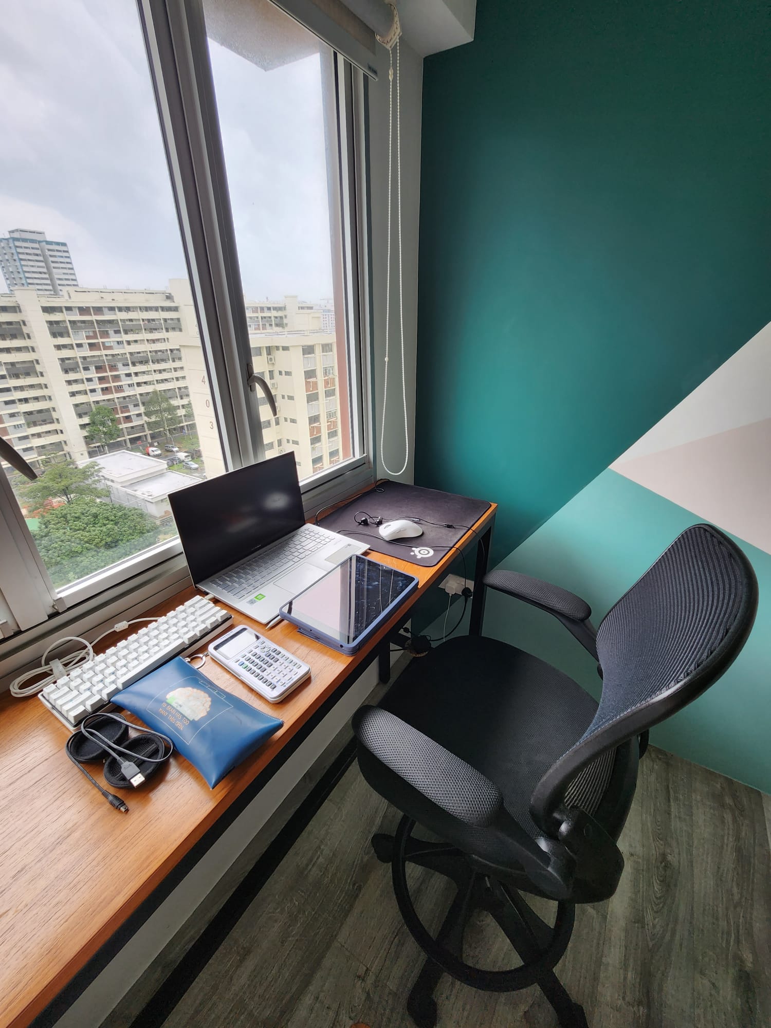 A versatile, multi-purpose home office - study space - window sill, desk setup, laptop, keyboard, tablet, mouse, headphones
