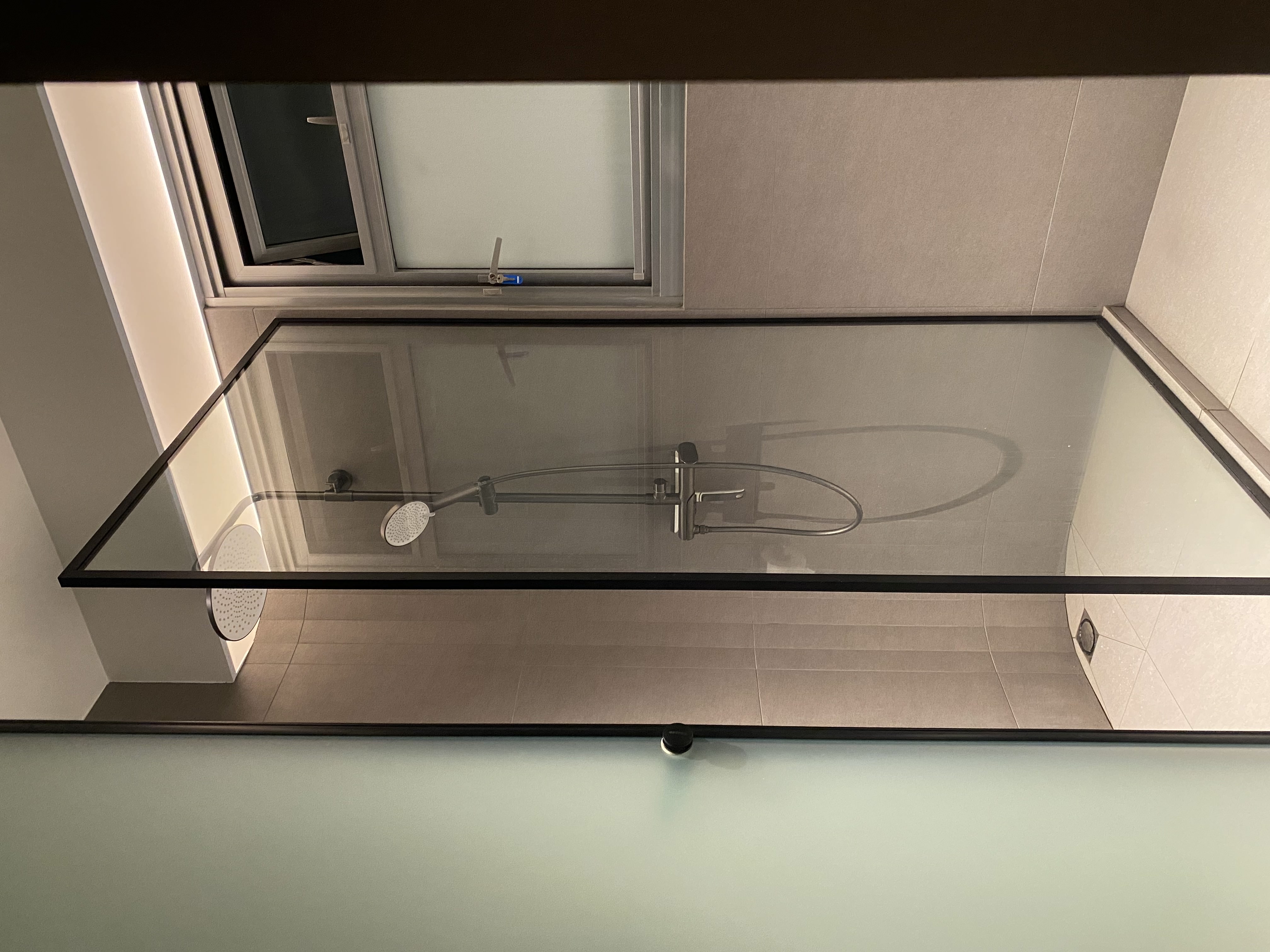 Seemingly entering a resort vibe kind of restroom, calm and relaxing - glass shower enclosure, modern bathroom, minimalist