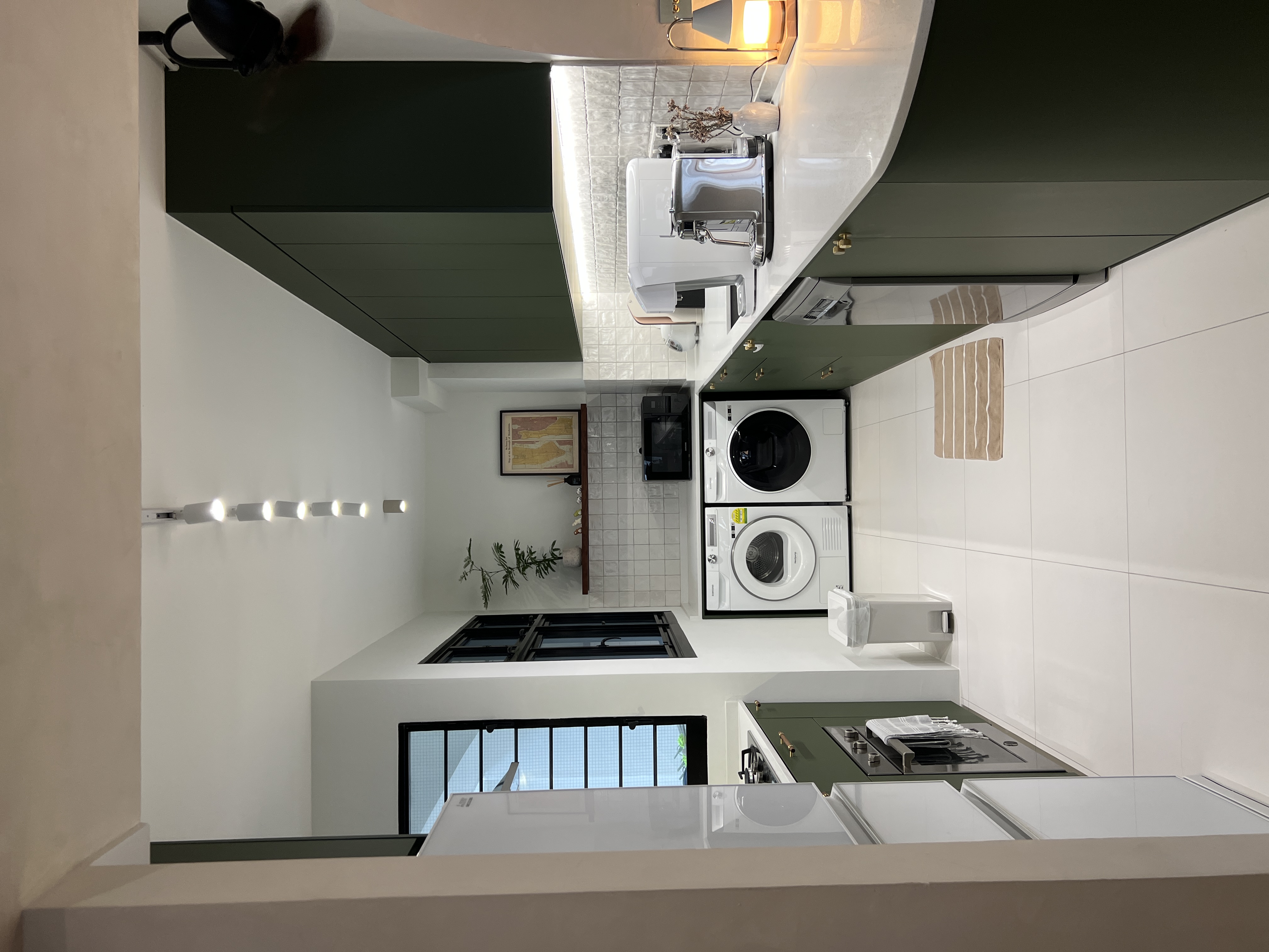 Cooking up a storm with an open-concept kitchen  - Modern kitchen with sleek appliances, minimalist design, white and green