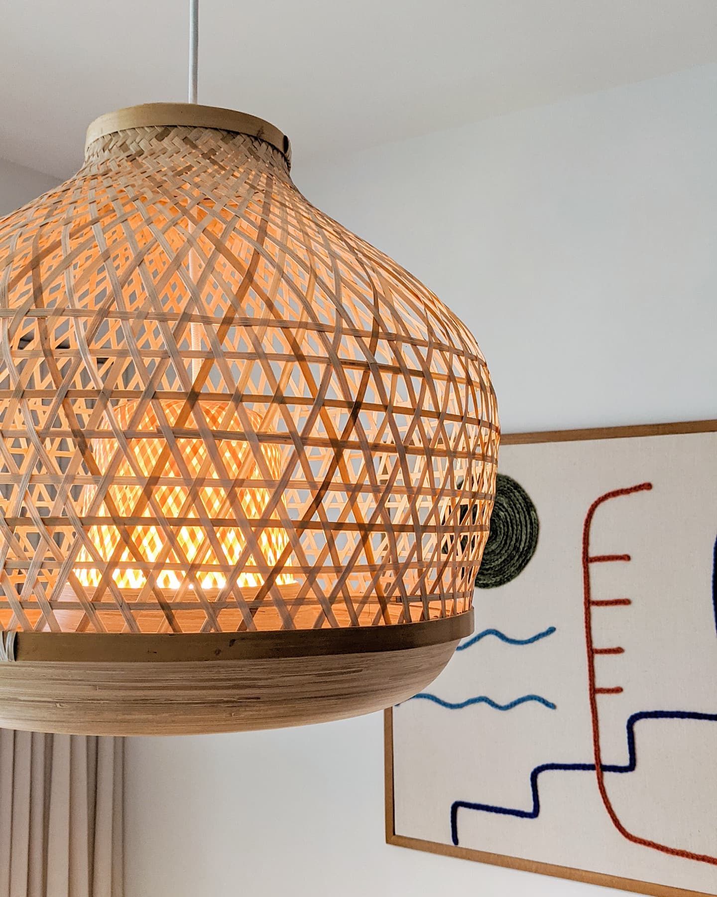 Our Urban Respite | Earthen Tropical Vibes - Woven lantern, natural light, geometric design, wooden frame, warm ambiance