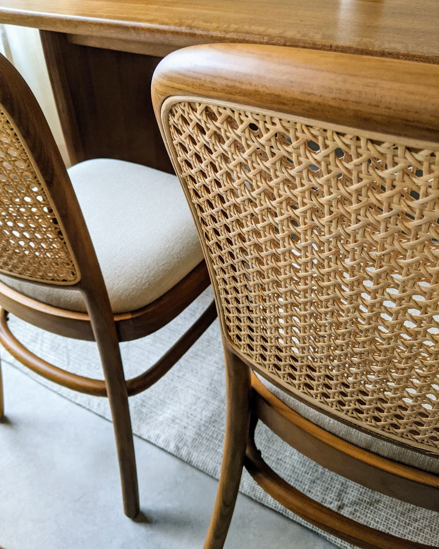 Our Urban Respite | Earthen Tropical Vibes - Wooden dining table, wicker chair, rustic design, wooden legs, natural wood