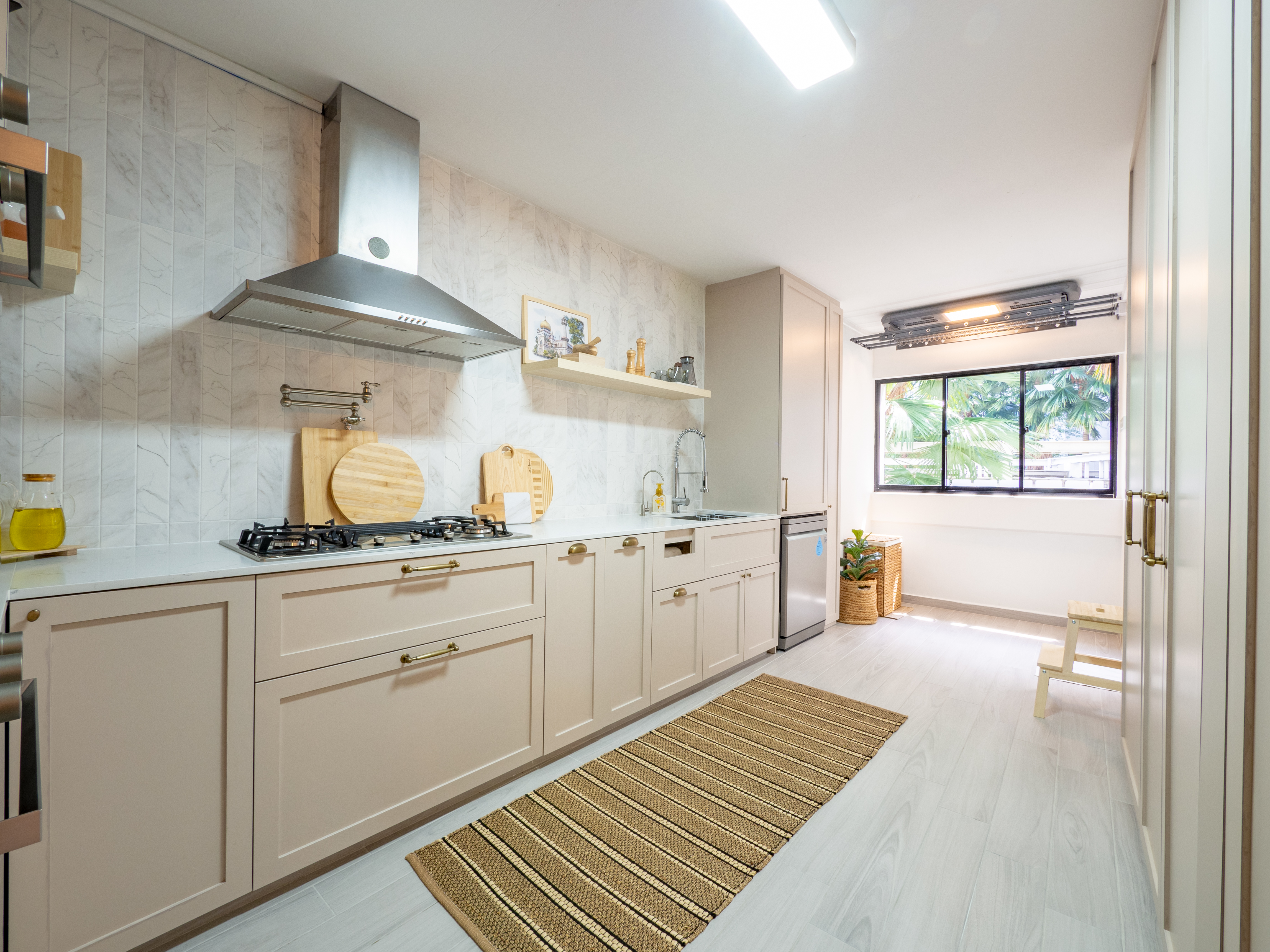 Built A Mid Century Modern Home With A Budget Of >100k - White marble tiles, stainless steel range hood, wooden cutting