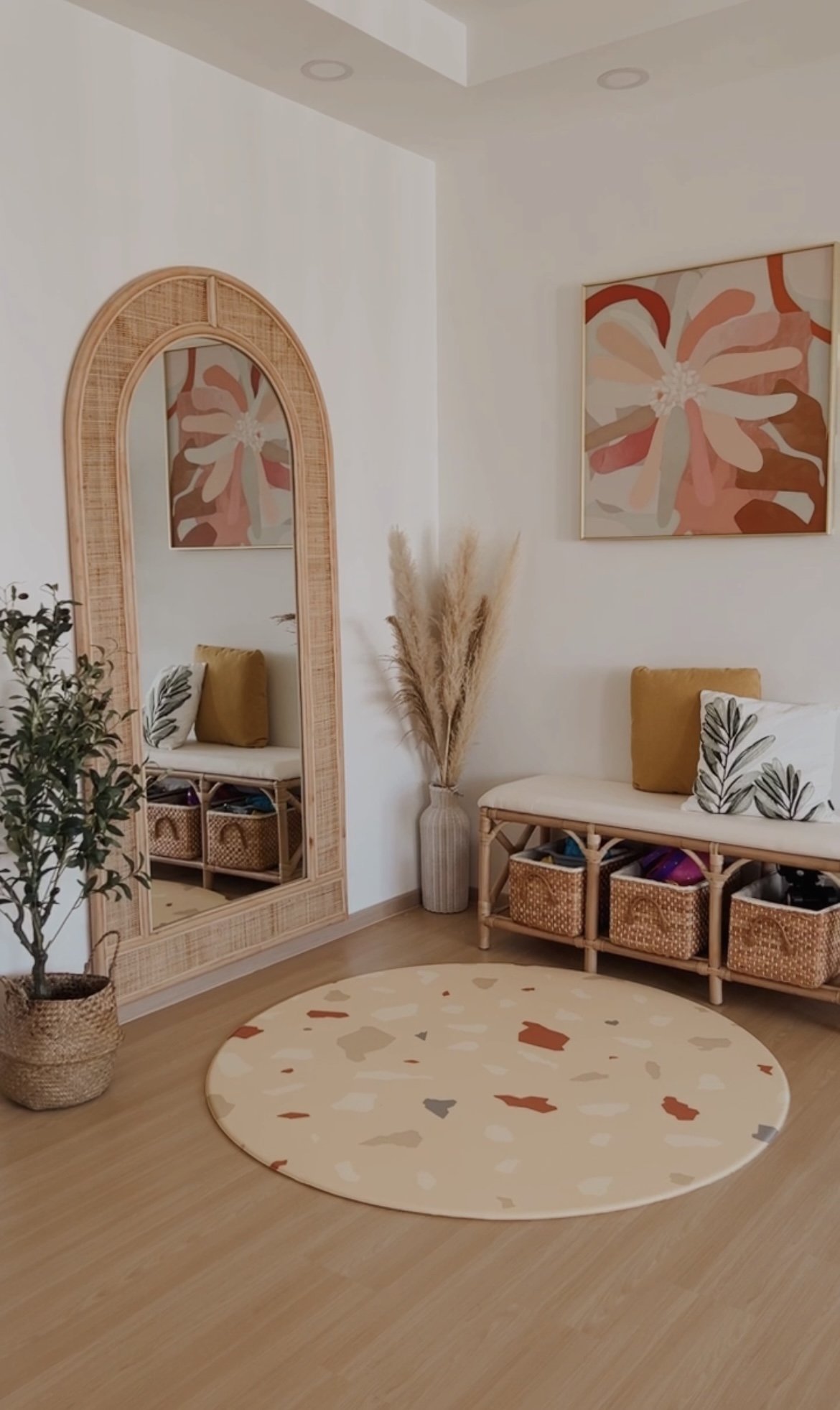 Welcome to our cosy and humble 5-room BTO :)  - Woven mirror, beige floor, modern decor, abstract painting, wicker bench
