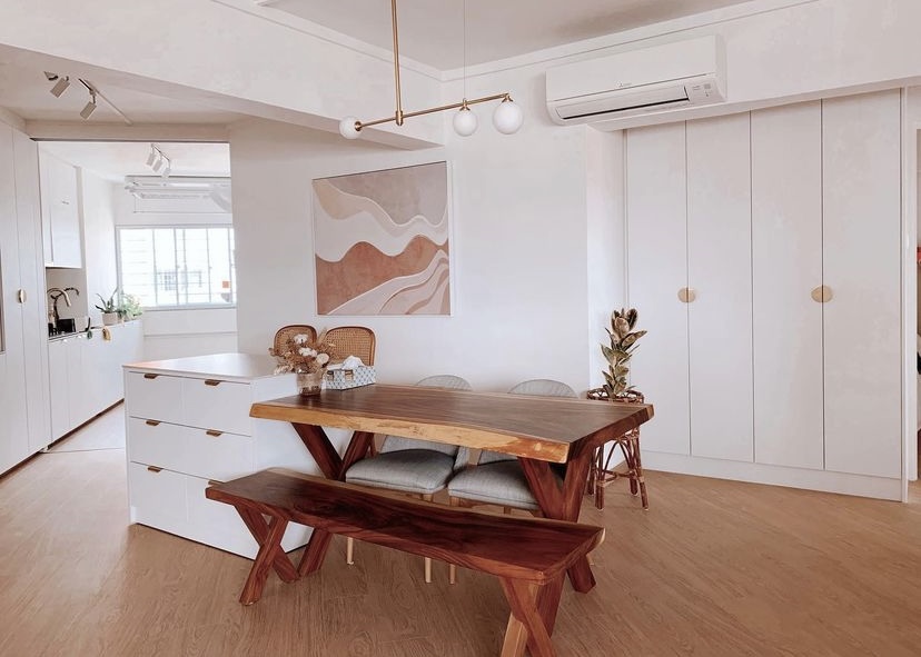 Our cozy, self-designed, odd-shaped home - Wooden dining table, minimalist kitchen, modern decor, white cabinets, abstract