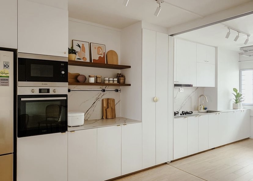 Our cozy, self-designed, odd-shaped home - White kitchen with modern appliances, built-in oven and microwave, sleek