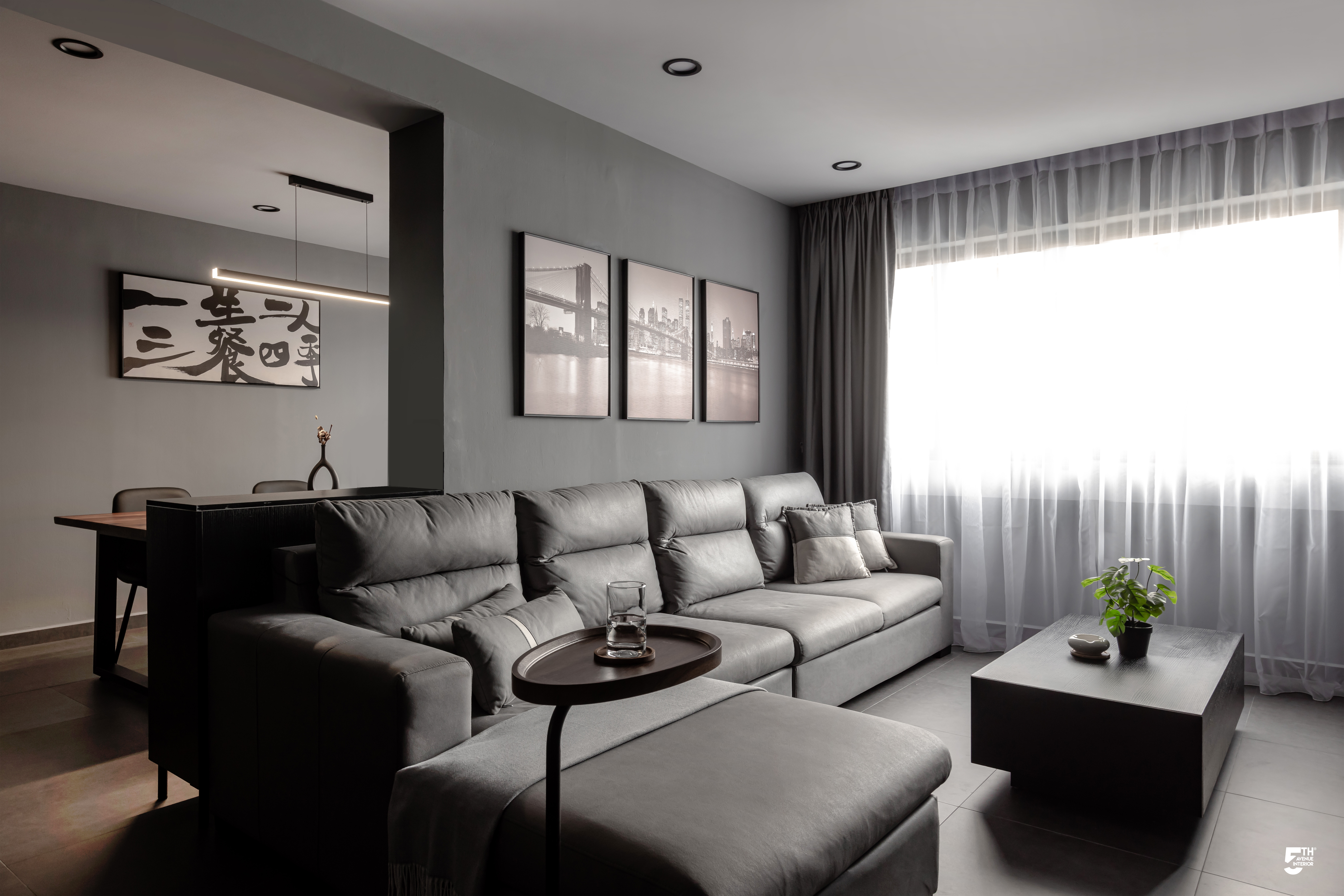A Cosy Dark Modern Contemporary Home - Modern living room with gray color scheme, minimalist design, large sectional sofa