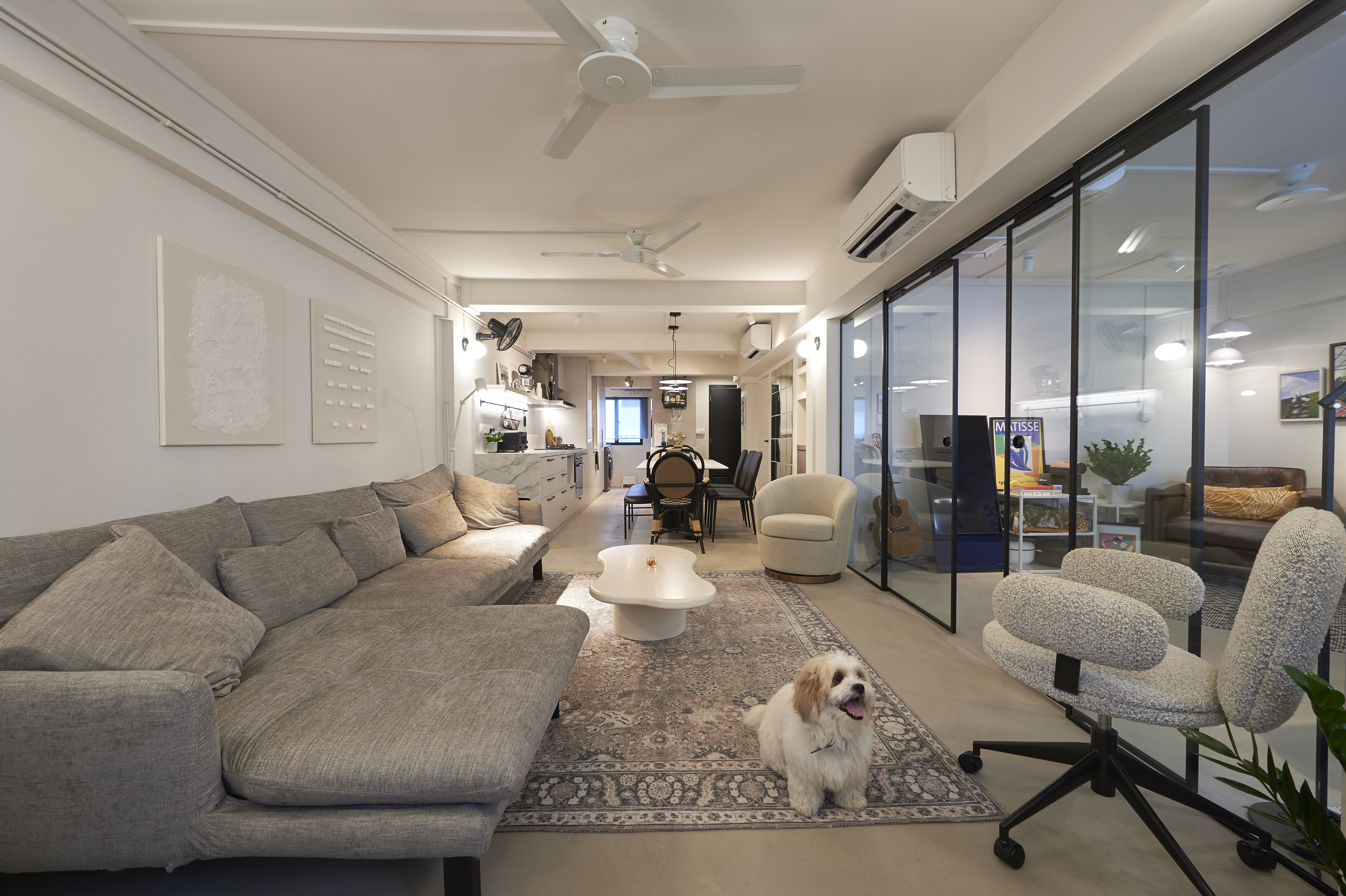 Monochromatic Everton Park home meant for hosting! - Modern living room with gray sofa, coffee table, and rug. Sleek office