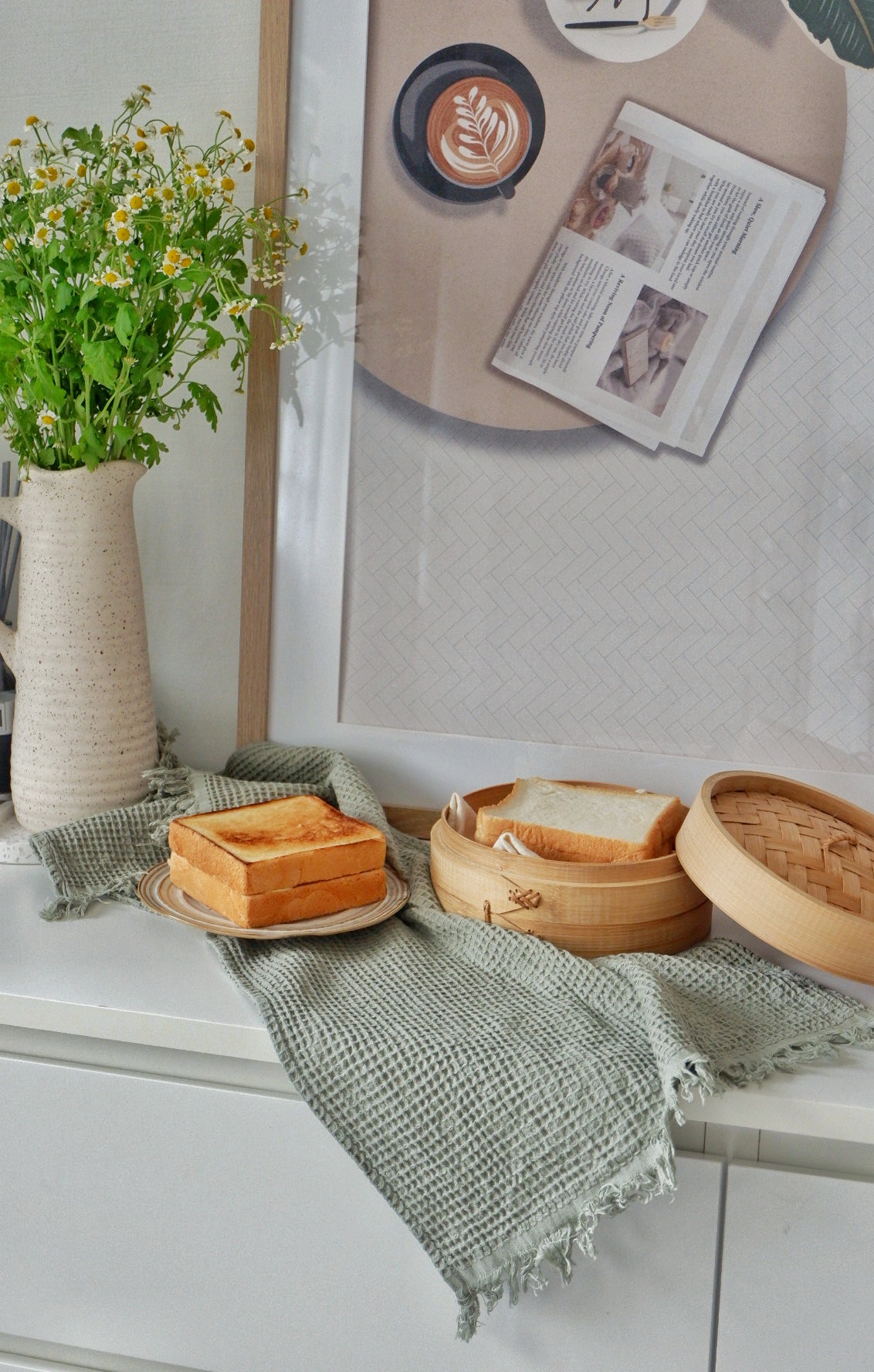 All Things Cosy In the Corners Of the Living Room - vase with yellow flowers, green leaves, rustic wooden table