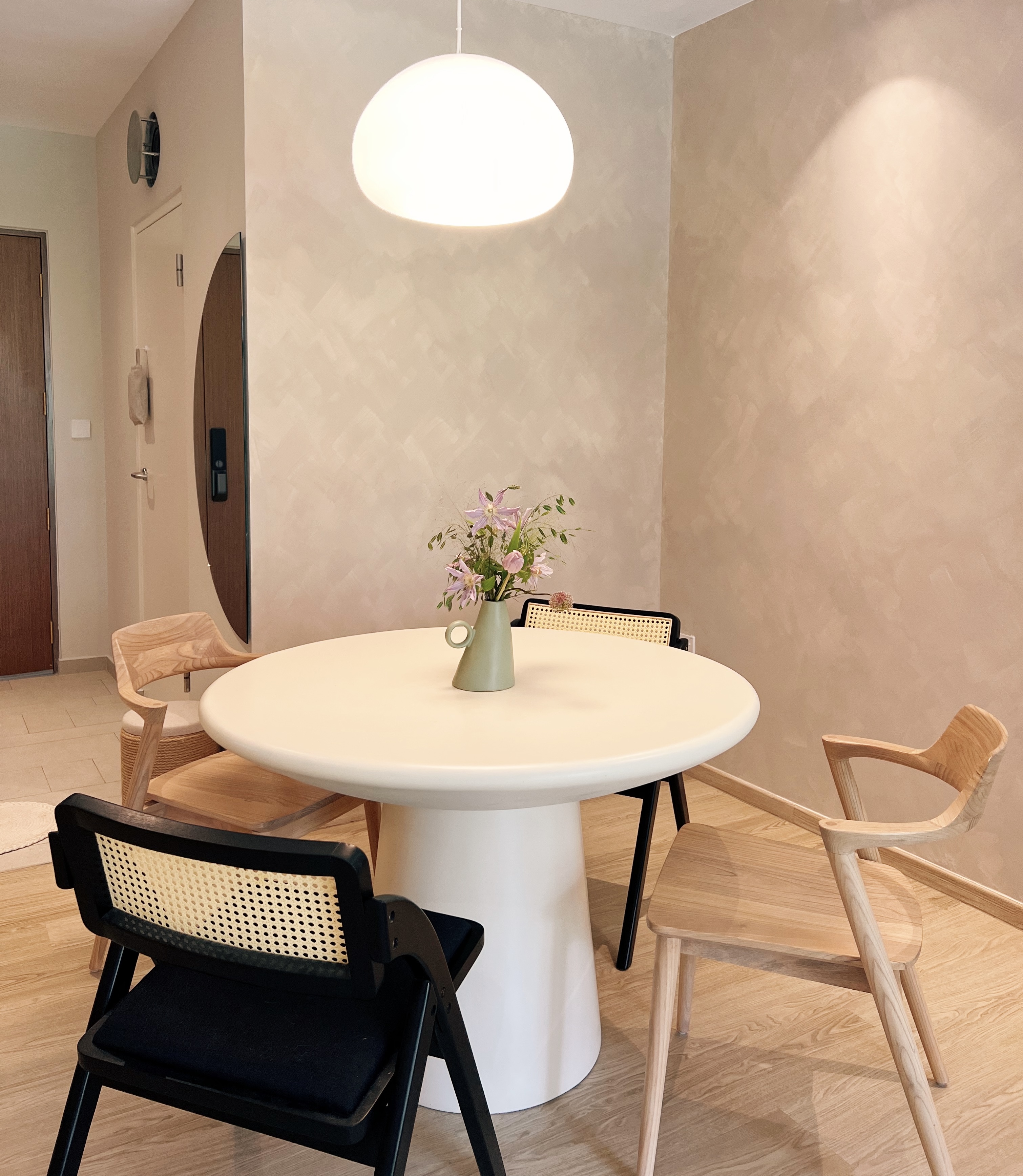 Sipping on Zen: Our minimal dining area - Modern dining room, minimalist design, round table, white tablecloth, wooden