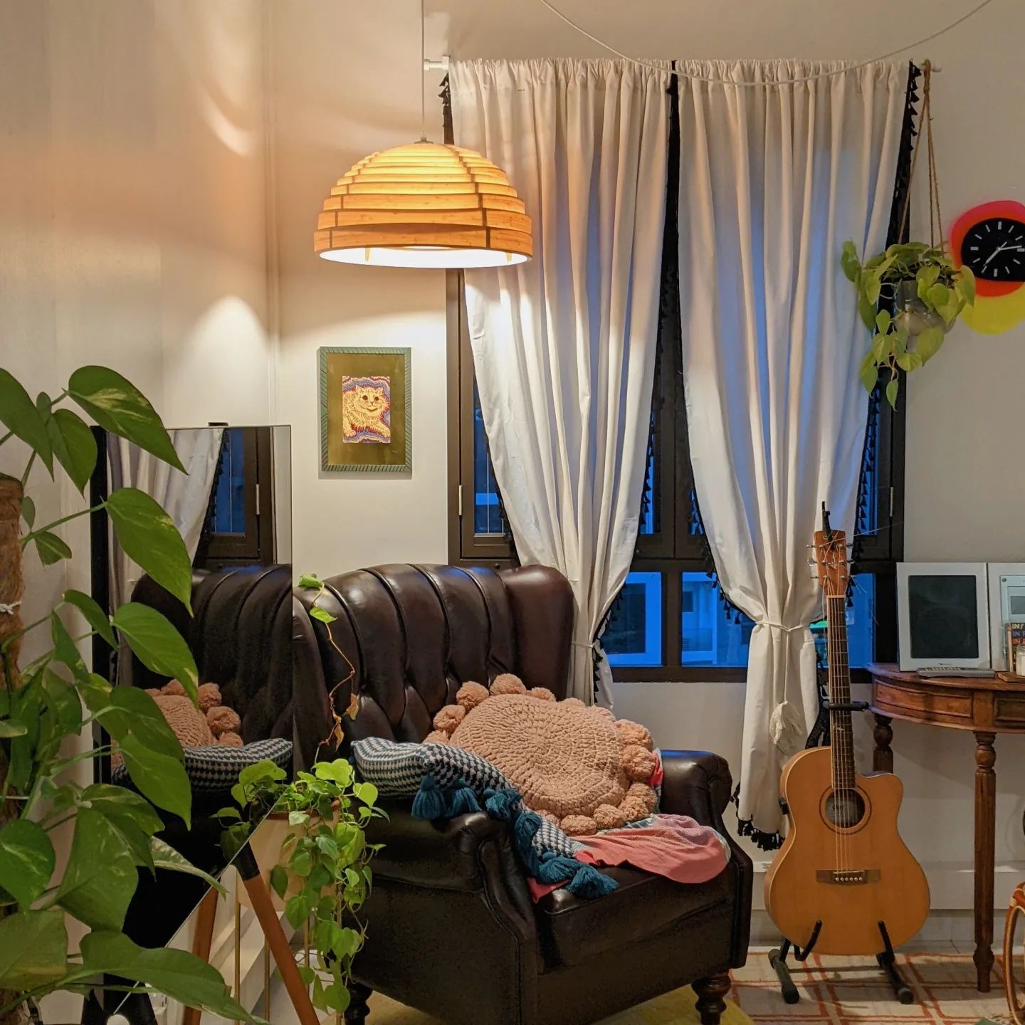 Highlights of Hominghumans - Wooden lamp with a dome-shaped shade, cozy living room, comfortable sofa with plush cushions