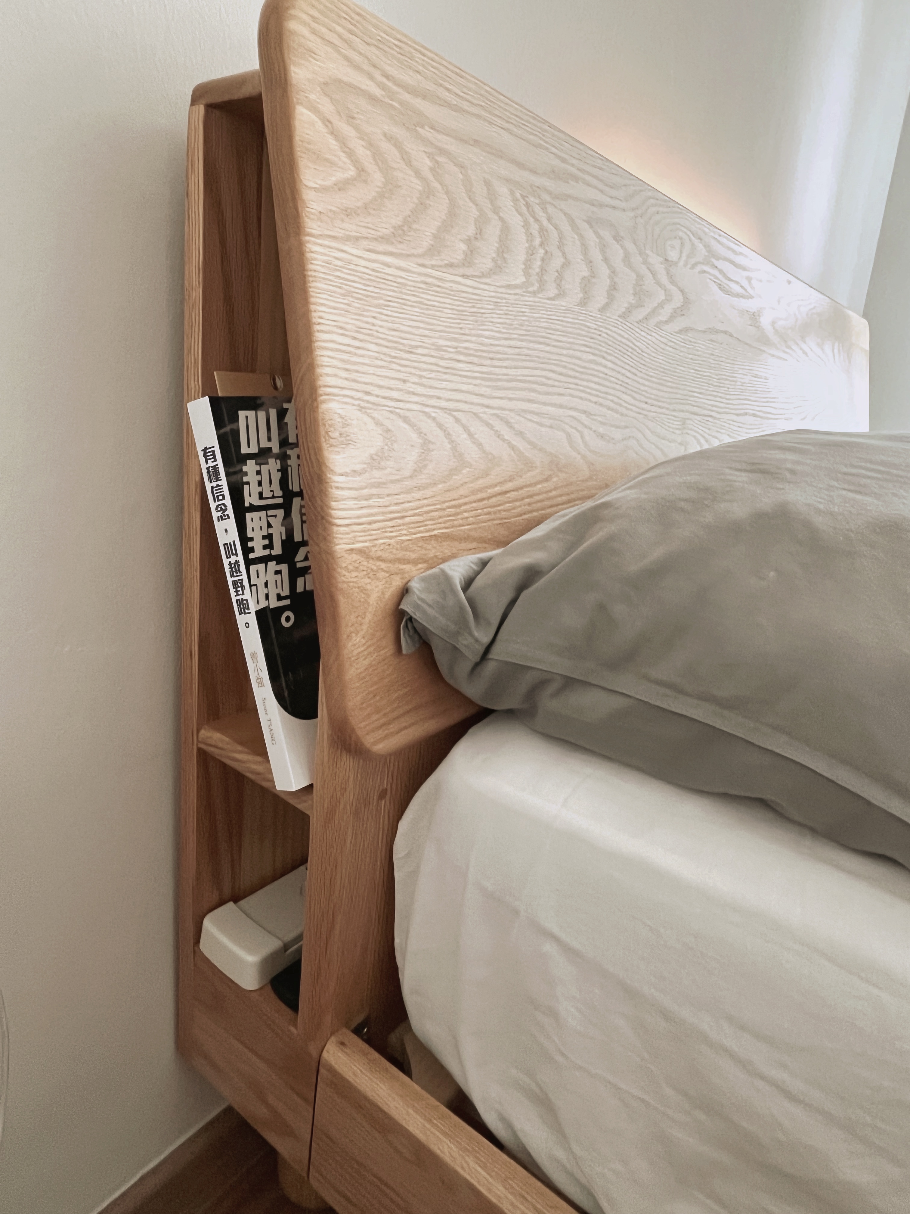 Comfort without clutter - Lagom in the bedroom - Wooden nightstand, minimalist design, modern decor, cozy bed, soft lighting