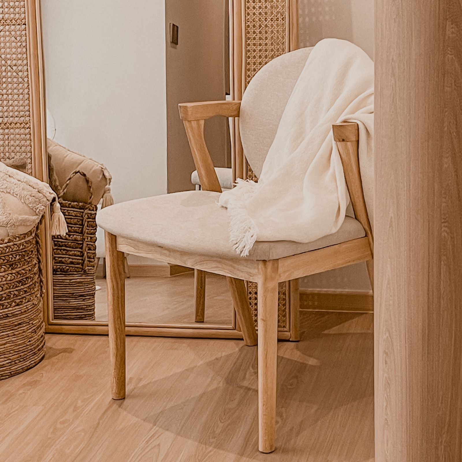 Bright & Airy Cosy Corner  - Wooden chair, beige cushion, woven basket, soft blanket, wooden frame, natural wood, minimalist