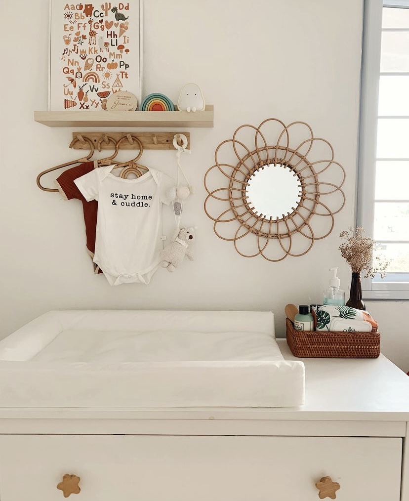 Our warm nursery - white crib, nursery decor, baby room, wooden shelf, alphabet wall art, colorful toys, white bedding, baby