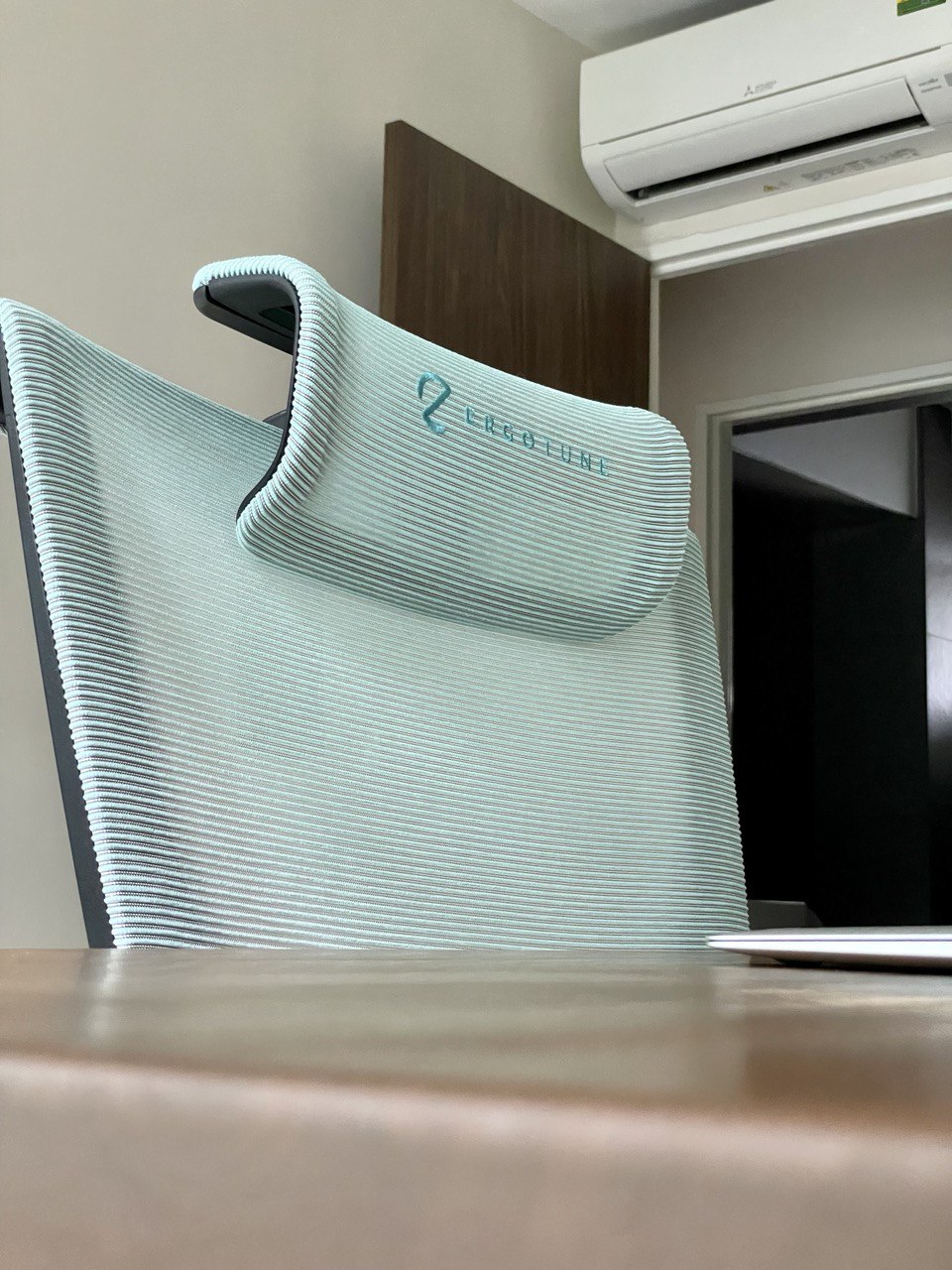 Study Room for All Things Studious  - Light blue ergonomic office chair, sleek design, breathable fabric, ergonomic support