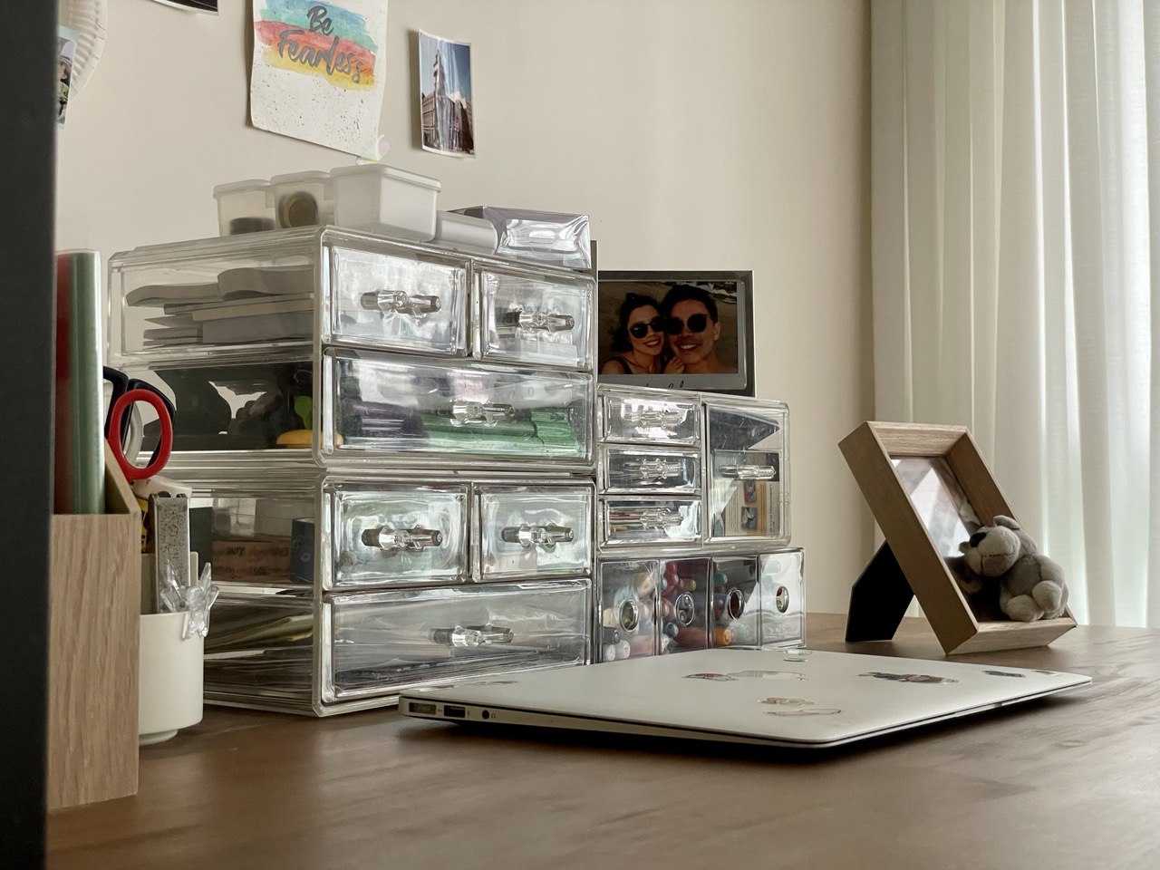 Study Room for All Things Studious  - Clear storage drawers, organized workspace, desk with laptop, framed photo, decorative
