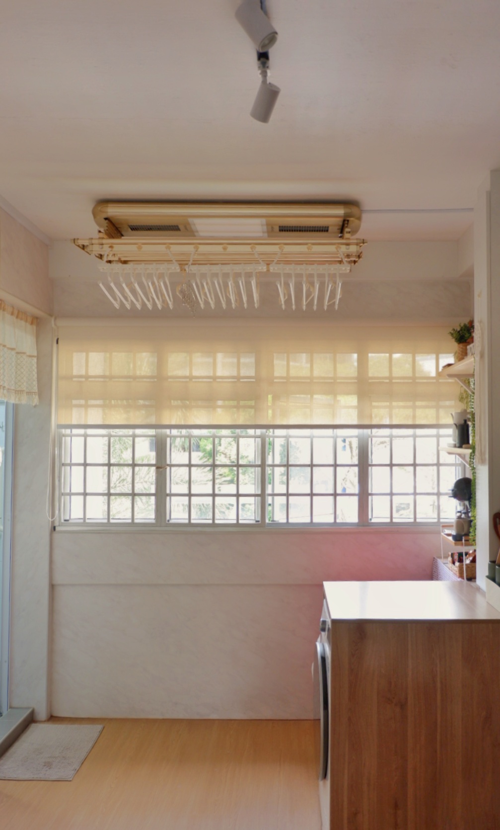A Functional Service Yard For All Your Possible Needs - Sunlit kitchen with modern design, beige walls, wooden countertop