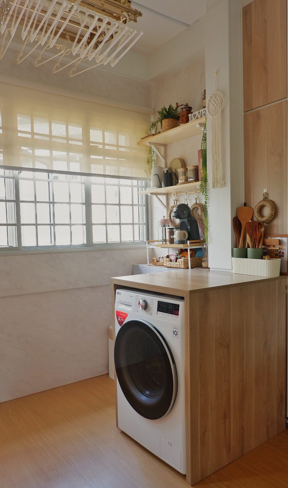 A Functional Service Yard For All Your Possible Needs - Wooden kitchen counter, modern washing machine, natural light