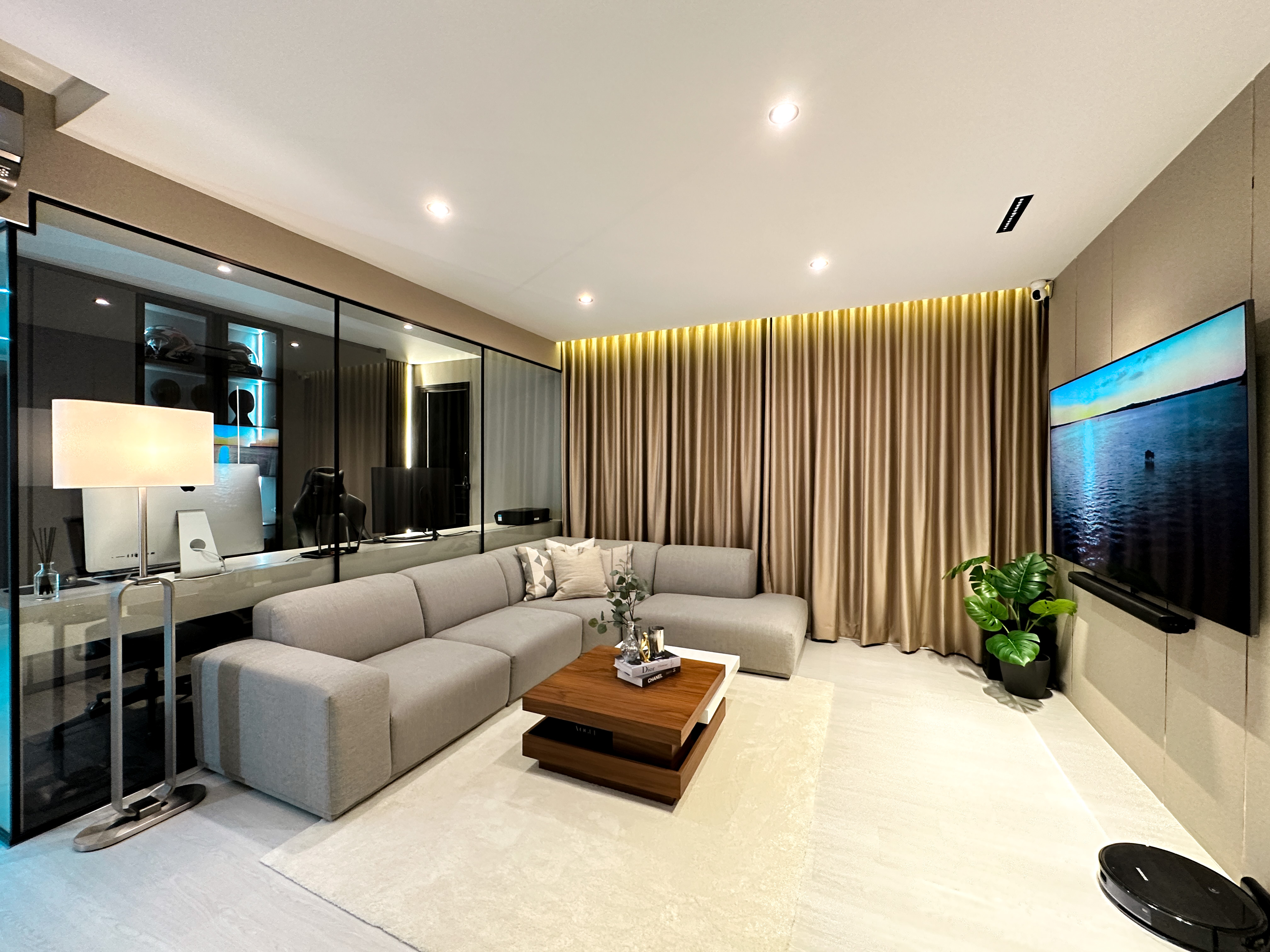 Hotel-like Luxe in a Home - Modern living room with sleek design, beige and gray color scheme, large comfortable sofa