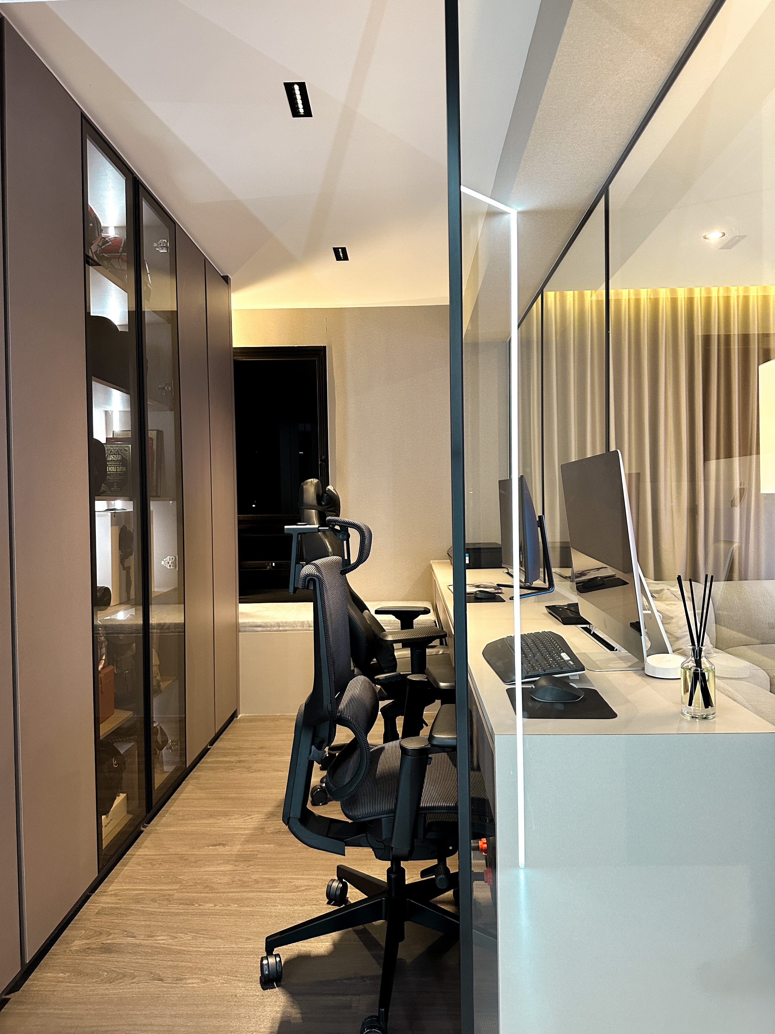 Hotel-like Luxe in a Home - Modern workspace, sleek office furniture, ergonomic chair, glass partition, minimalist design