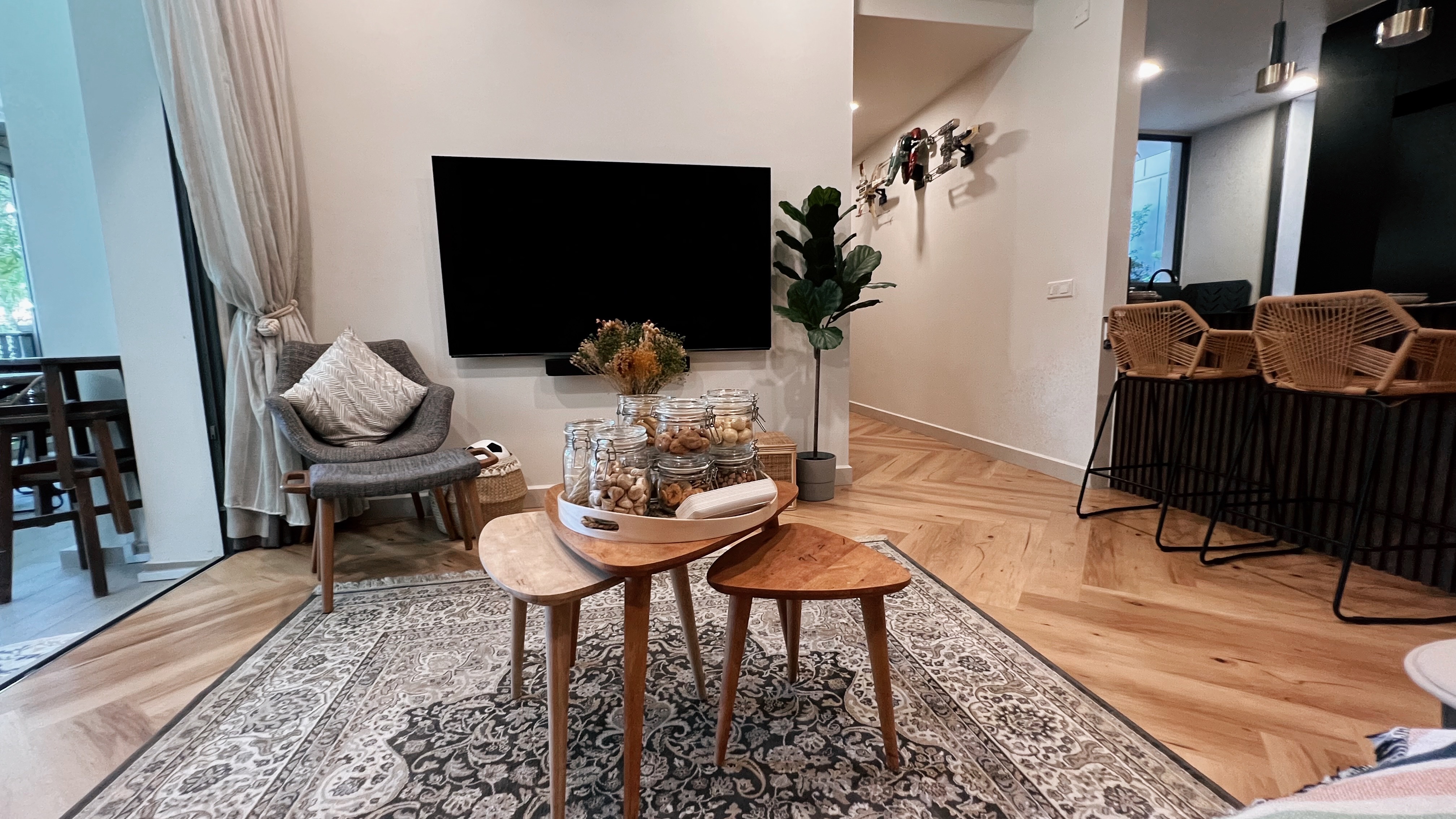 1260sqft ground floor unit with a garden view! - Modern living room, cozy seating area, minimalist decor, large flat-screen