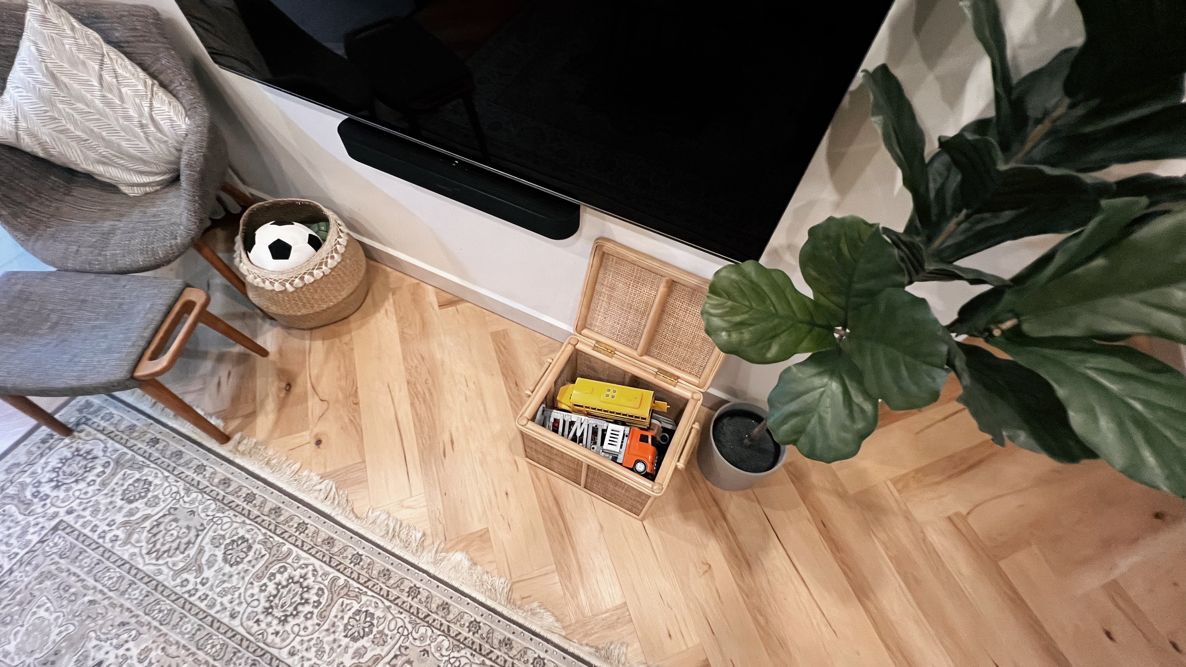 A living room refresh for Hari Raya! - gray armchair, wooden chair, cozy corner, rug, patterned rug, indoor setting, modern
