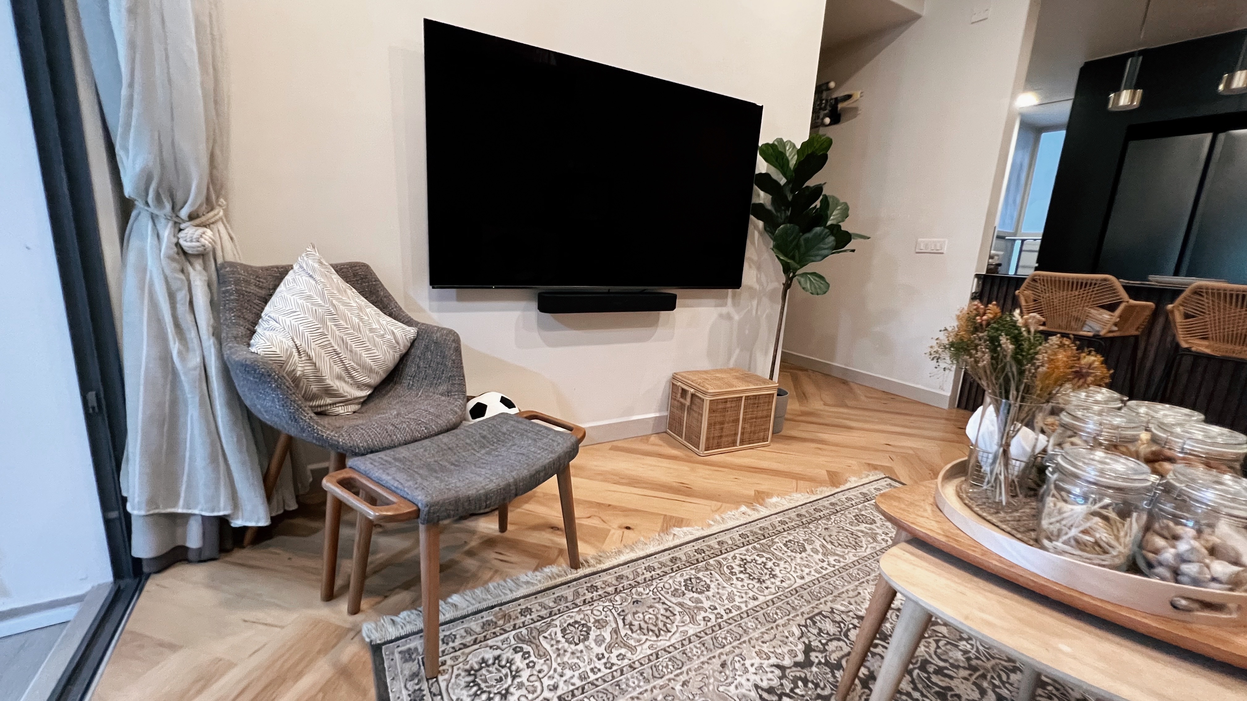 A living room refresh for Hari Raya! - Modern living room, cozy seating, gray armchair, wooden legs, herringbone wooden