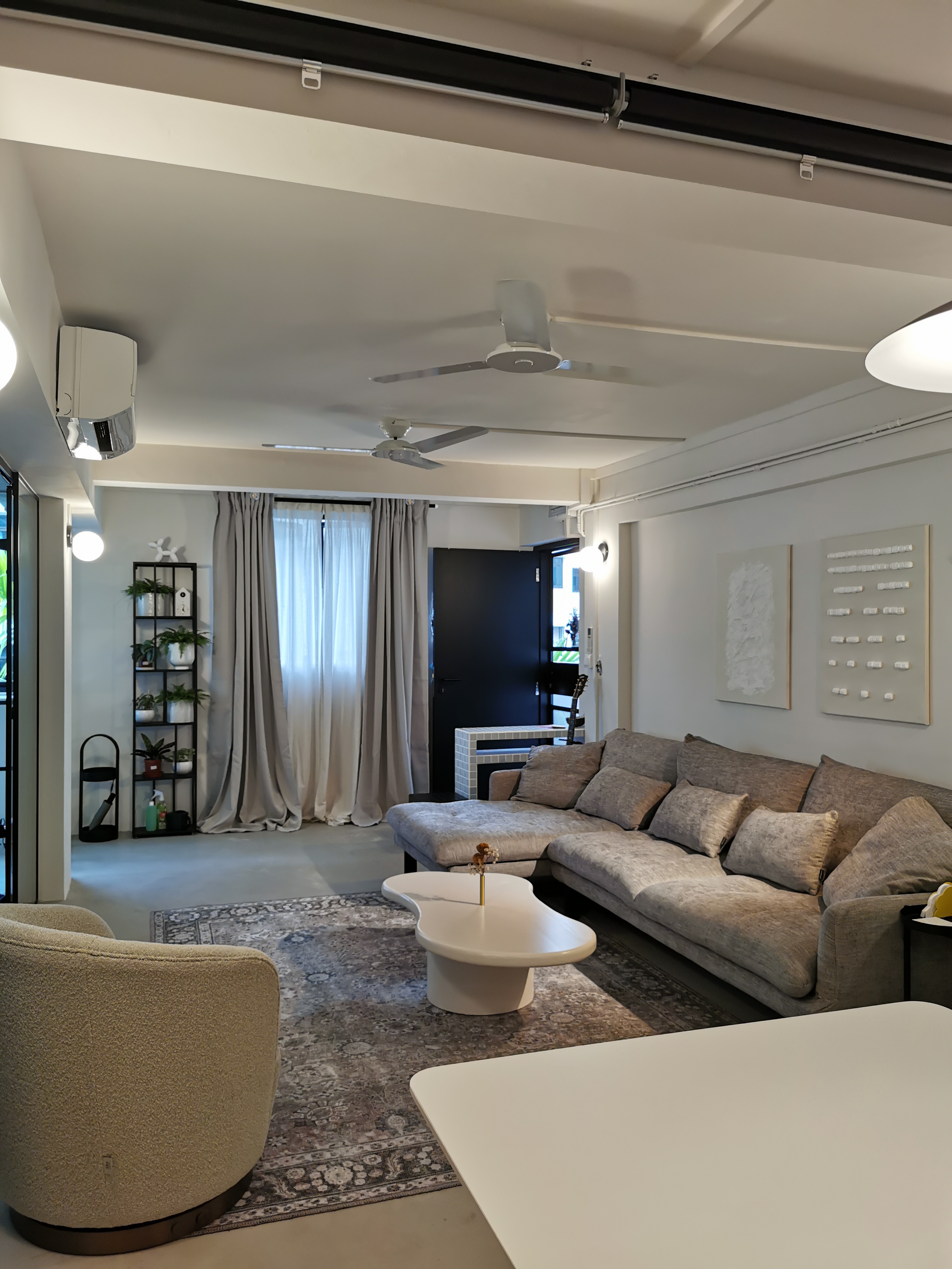 Monochromatic-living-room-with-recycled-art-from-our-renovation