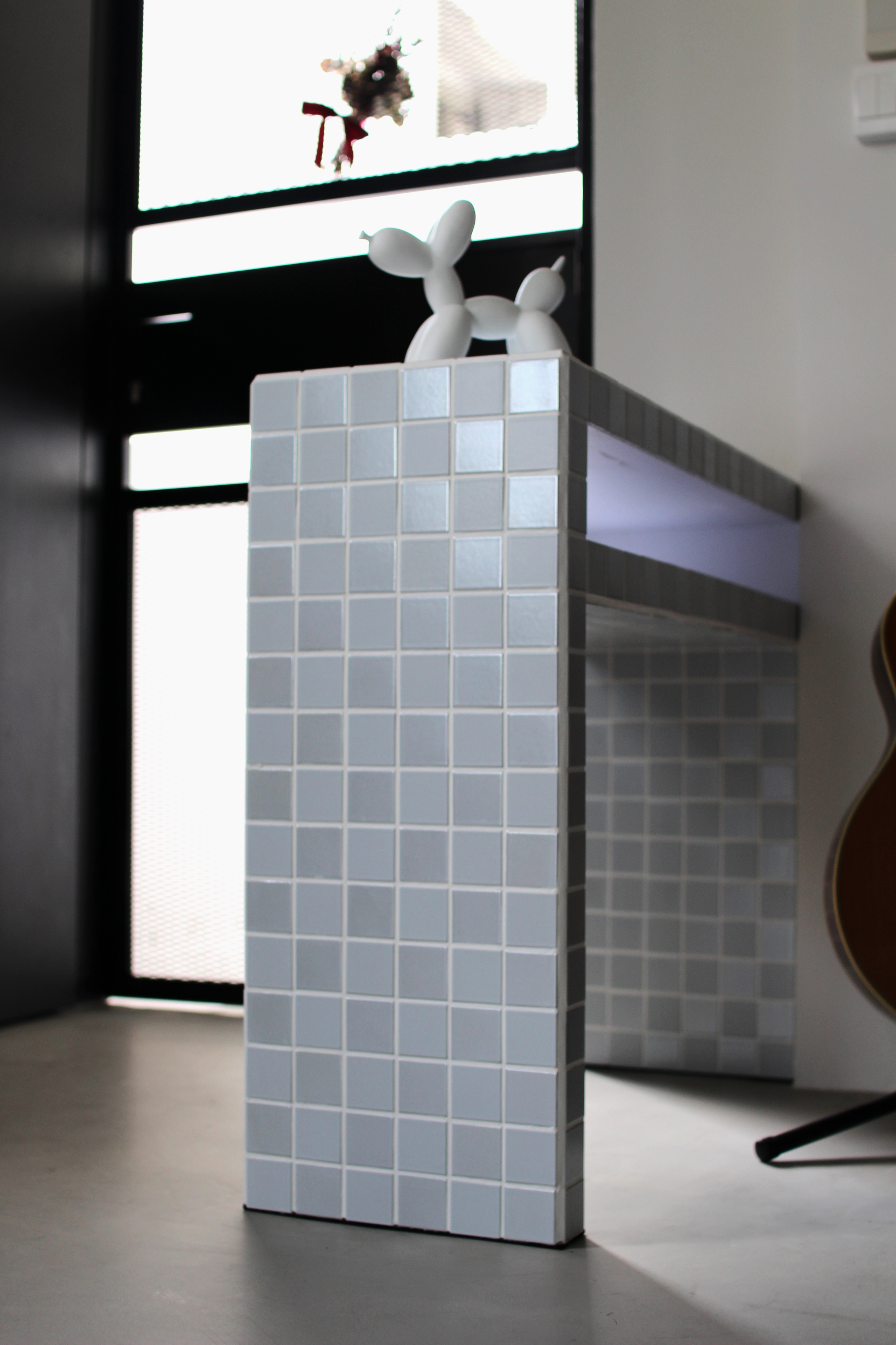 Monochromatic living room with recycled art from our renovation - Modern minimalist interior, white and gray tiles, abstract