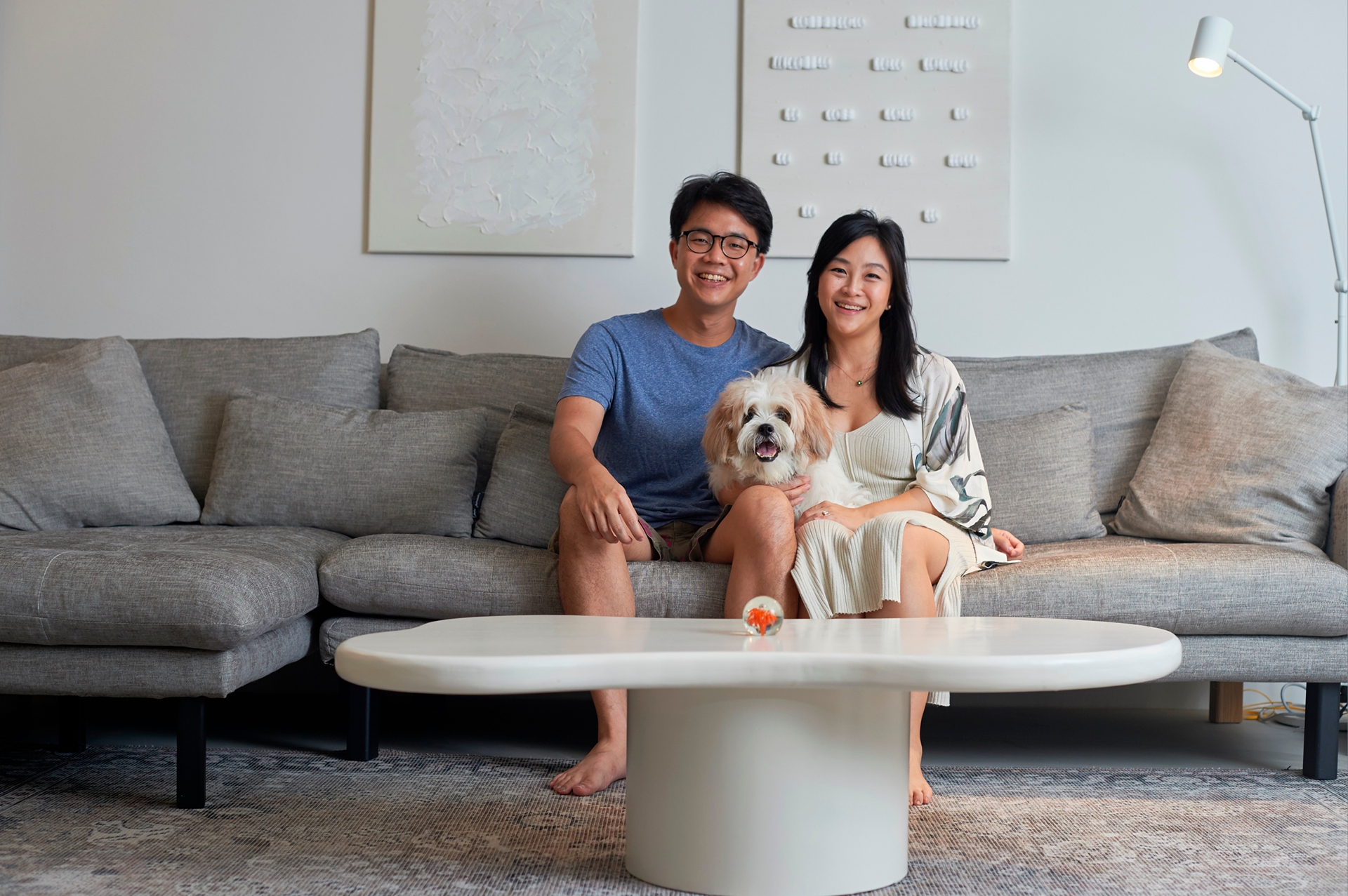 Monochromatic living room with recycled art from our renovation - Modern living room, cozy atmosphere, couple sitting
