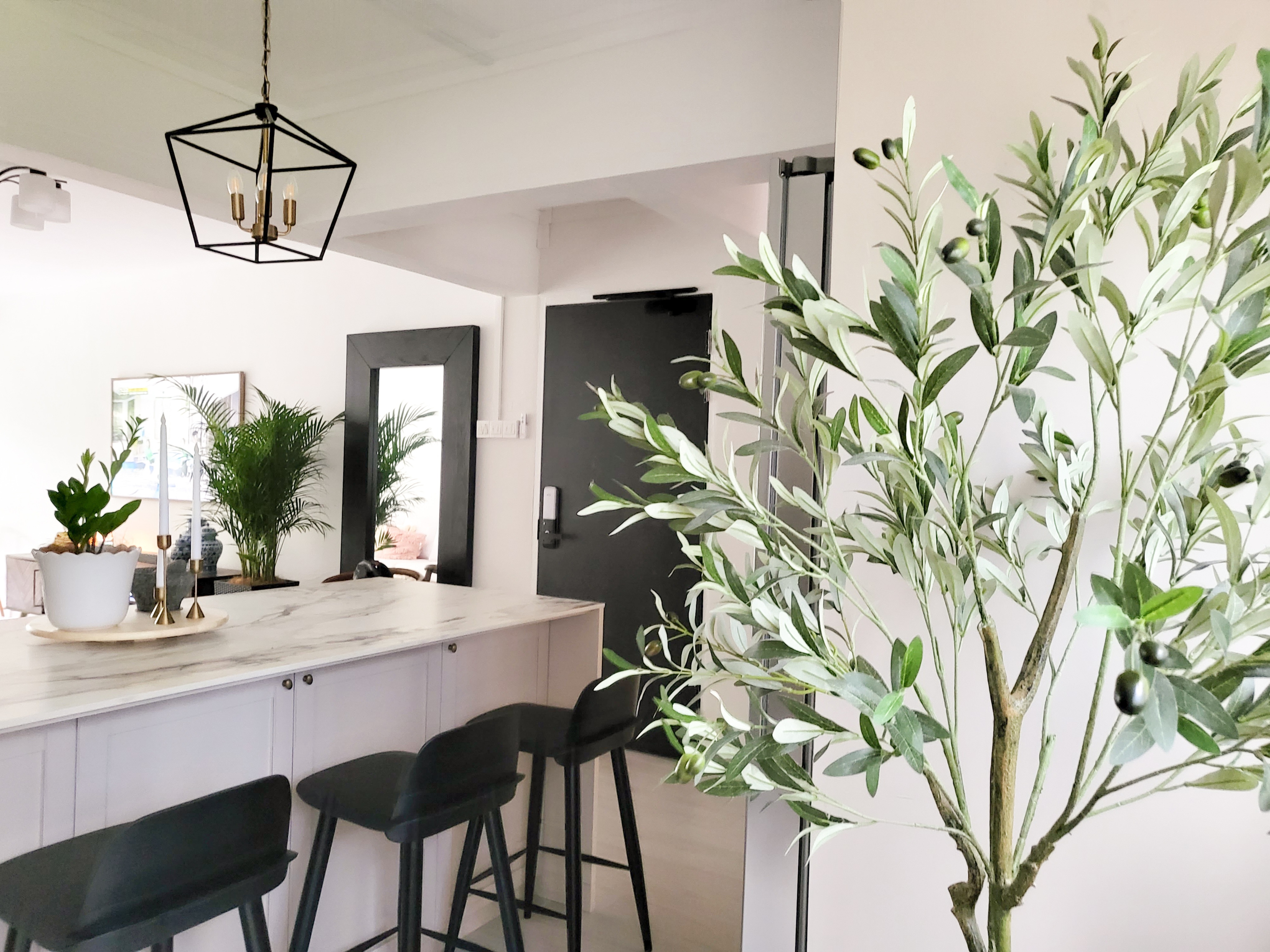 Quaint and Charming Dining Spaces  - modern kitchen, minimalist design, contemporary decor, sleek pendant light, white marble