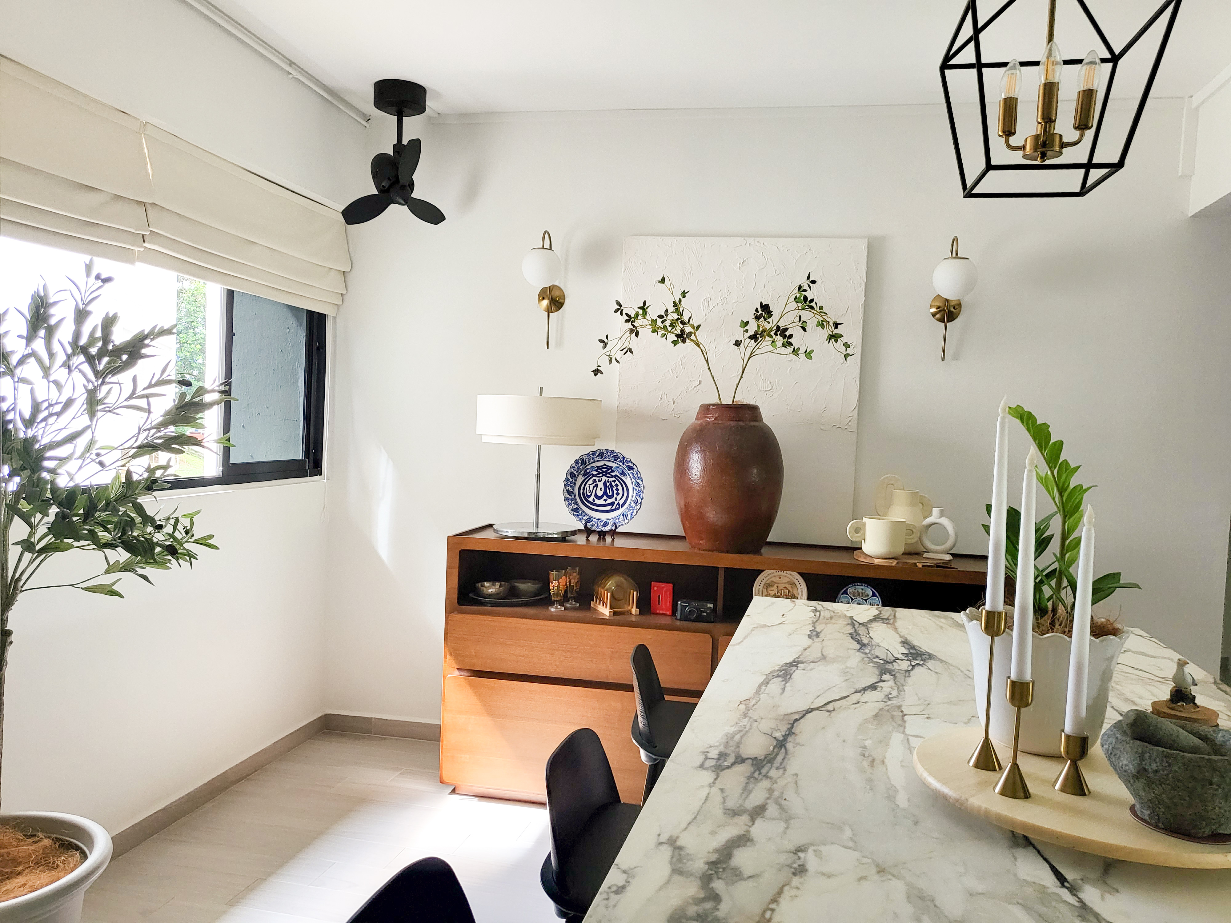 Quaint and Charming Dining Spaces  - Modern minimalist interior, white walls, large window with blinds, black ceiling fan