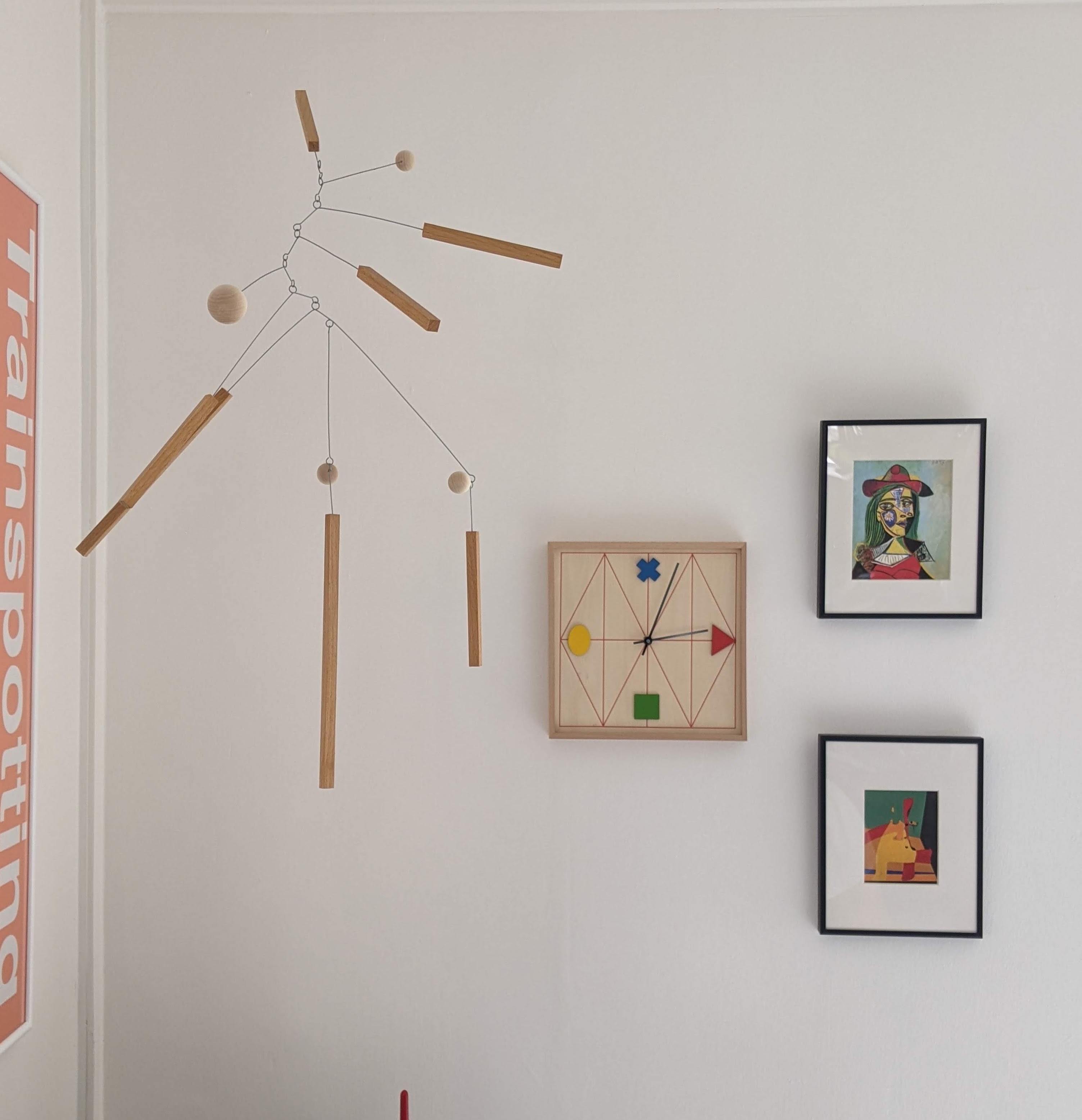 Living with Art - Modern minimalist design, abstract art, colorful paintings, geometric clock, hanging light fixture