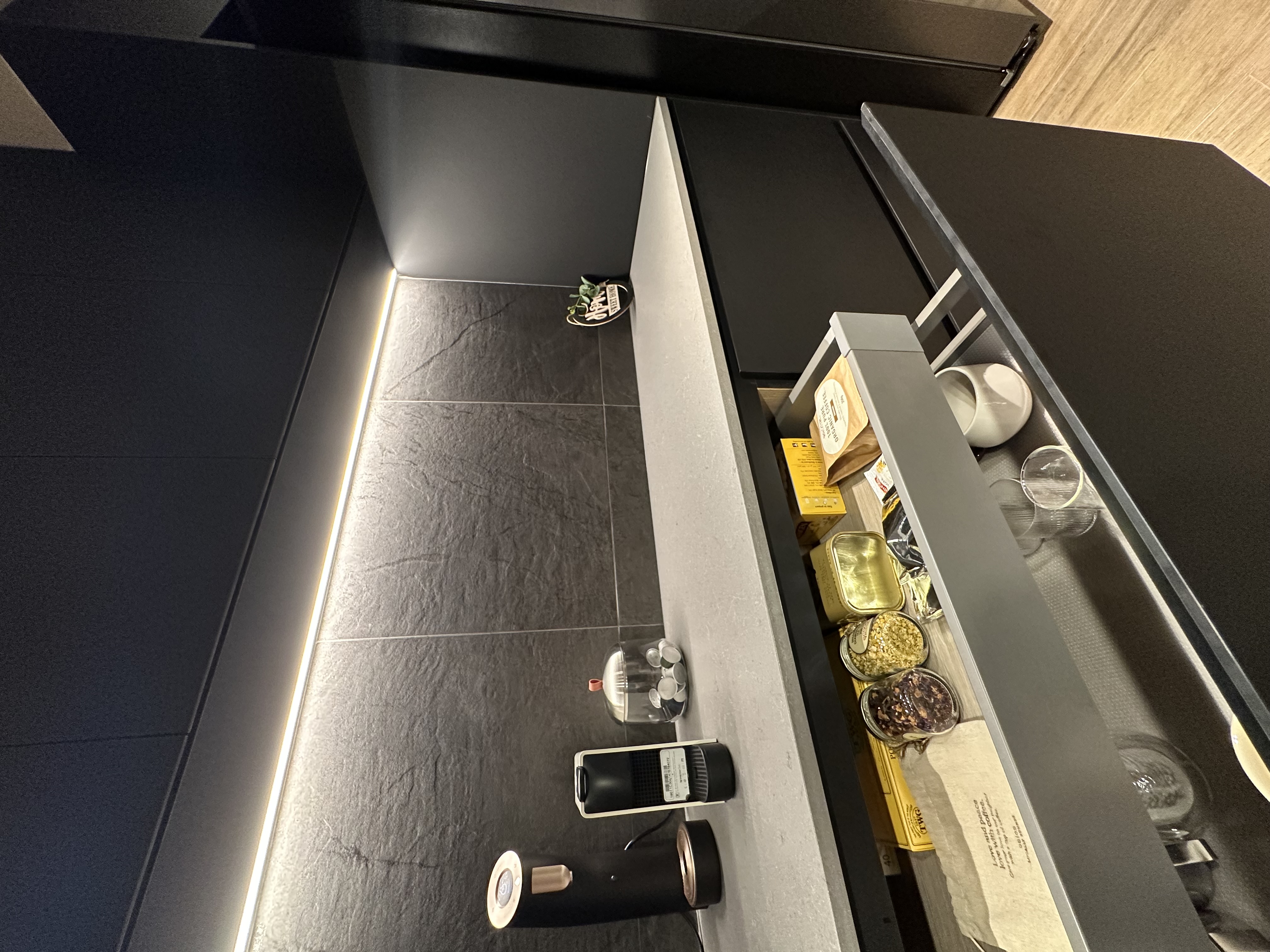 where the eating happens 😋 - modern kitchen countertop, sleek black cabinets, minimalist design, contemporary kitchen, open