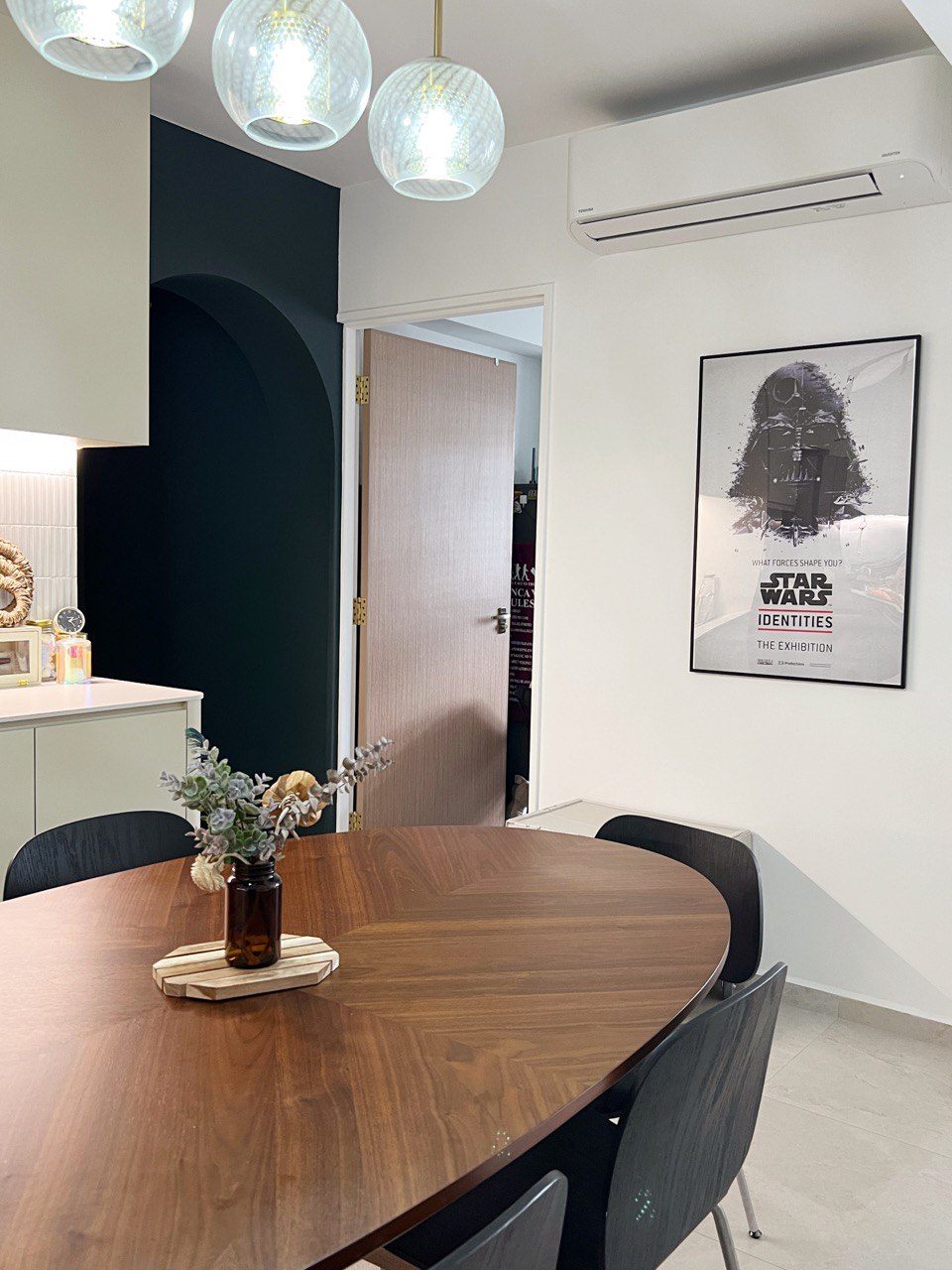 Dining area in front of our 4 room BTO open kitchen - Wooden dining table, modern kitchen, minimalist decor, black chairs