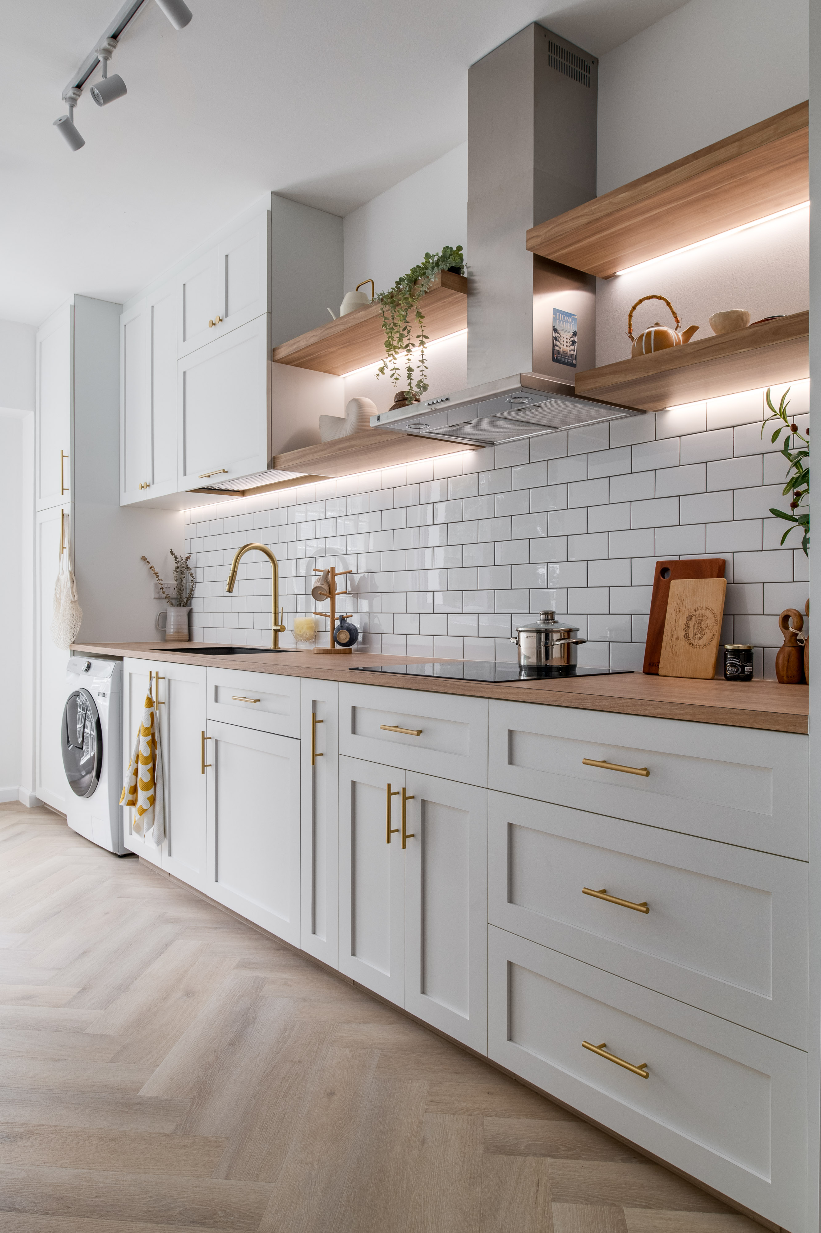 Our Farmhouse Kitchen Dreams - White kitchen with modern design, wooden cabinets and drawers, white tiled backsplash