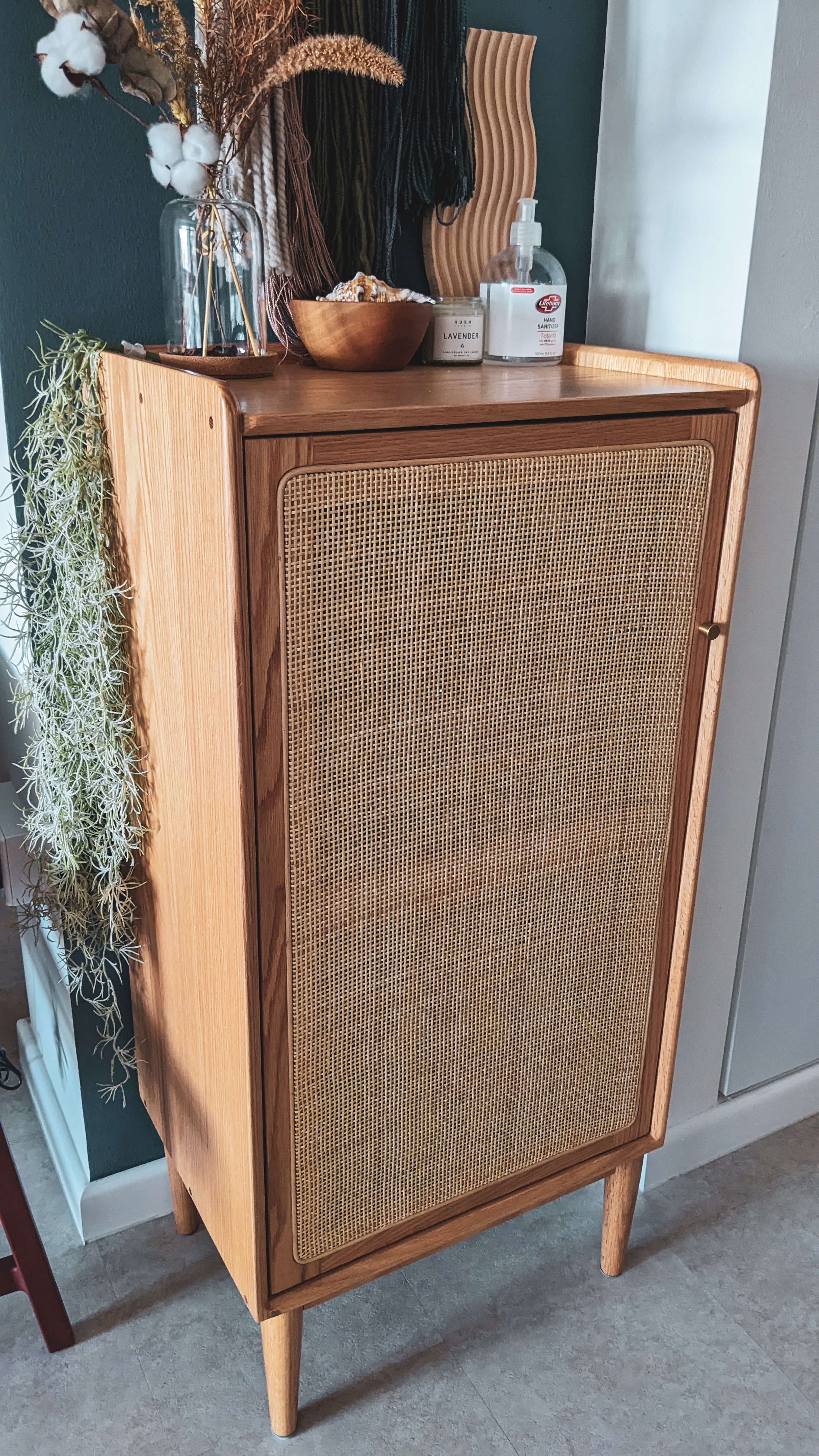 Enter in | Welcoming our Guests - vintage wooden cabinet, natural wood finish, woven texture, rustic charm, vintage decor
