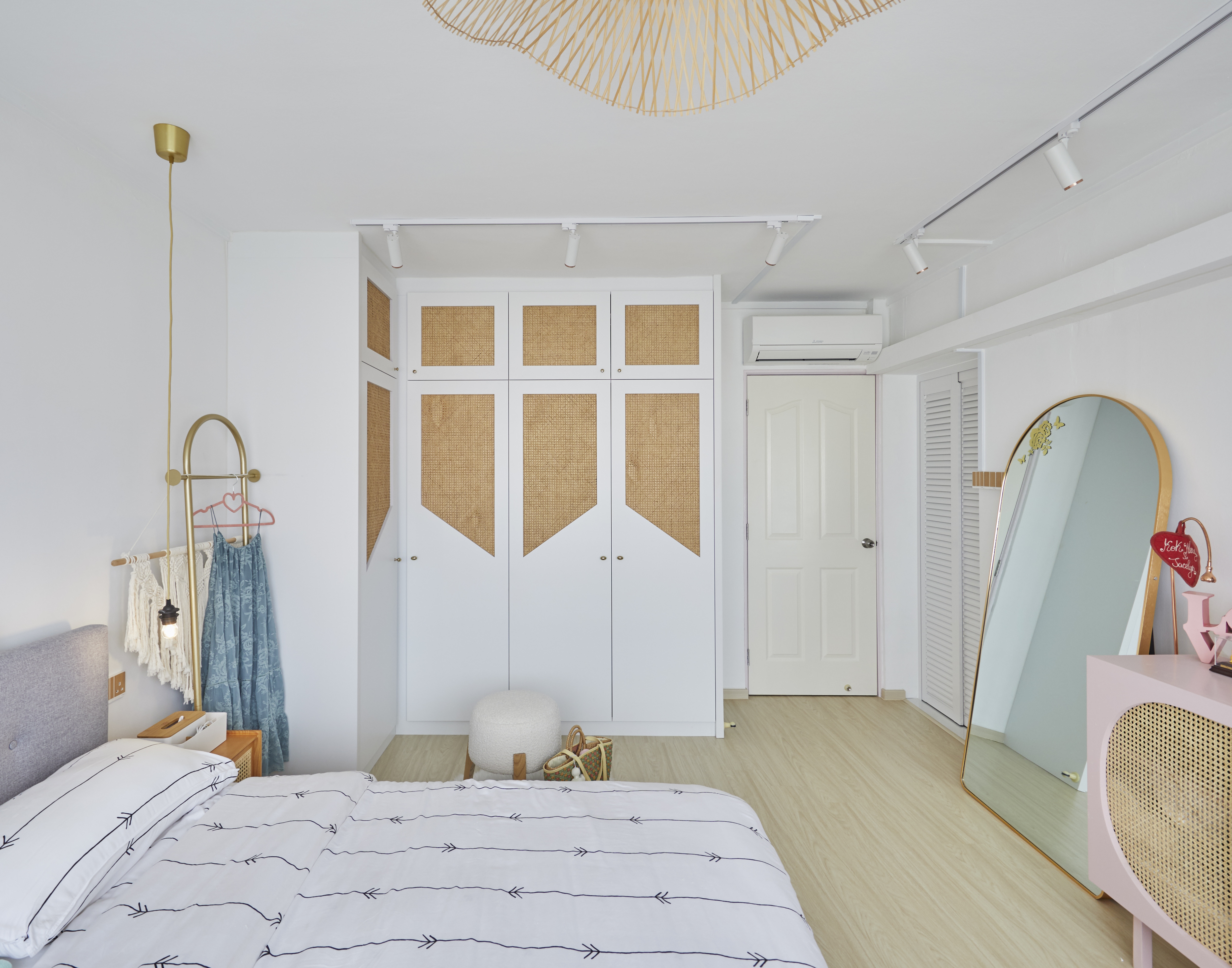 Sanctuary with Balinese vibes - Gold pendant light fixture, white ceiling, minimalist design, white walls, modern decor