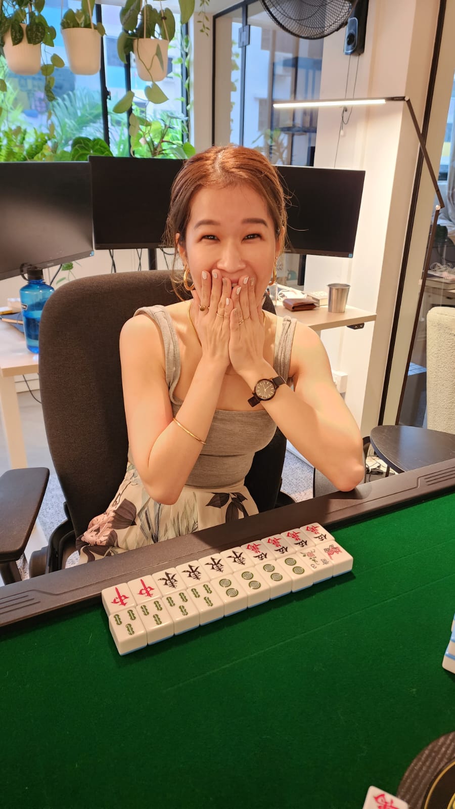 Converting our study into a Mahjong Den - Gambling, poker, table, woman, smiling, indoor, office, computer, chair, plants