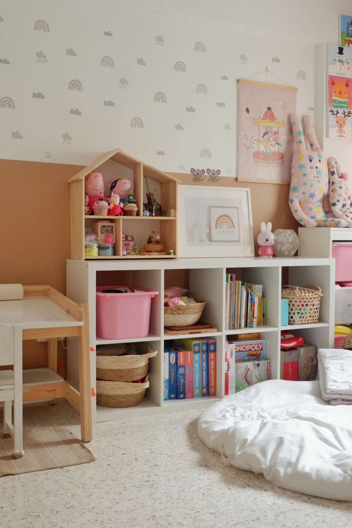 Multi Purpose Playroom & Studyroom  - Children's playroom with a soft, pastel color scheme, featuring a wooden playhouse, a
