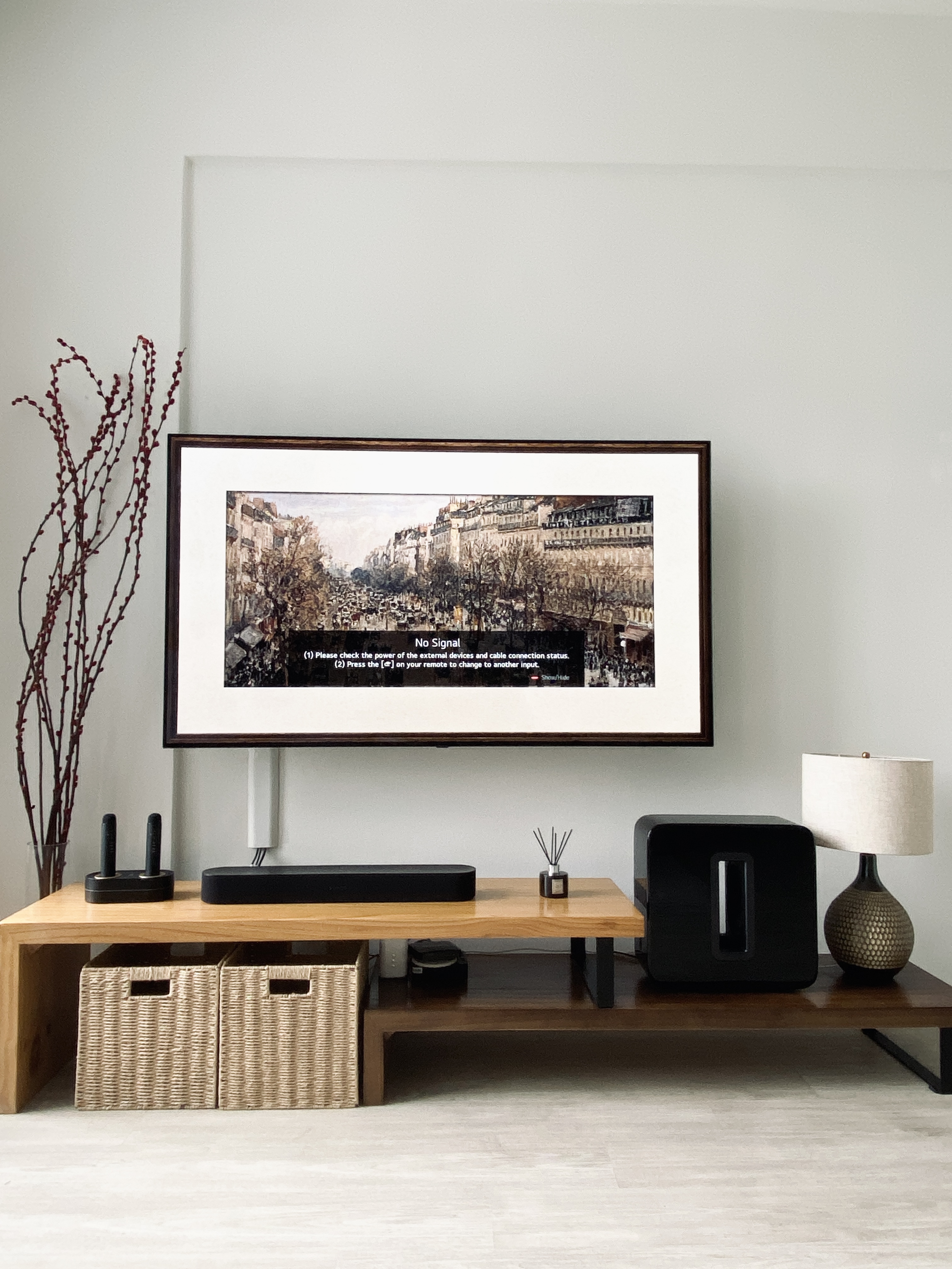 The wrong TV rack came but we tried to make it work - Modern living room, minimalist decor, framed picture, cityscape