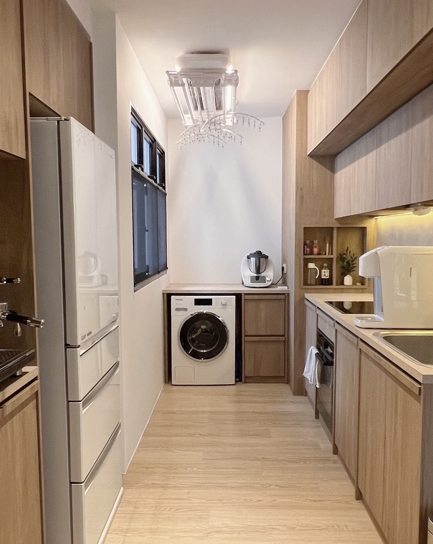 Clean and Fresh: Our Minimalist Laundry Area - Wooden cabinetry, modern kitchen, stainless steel appliances, white