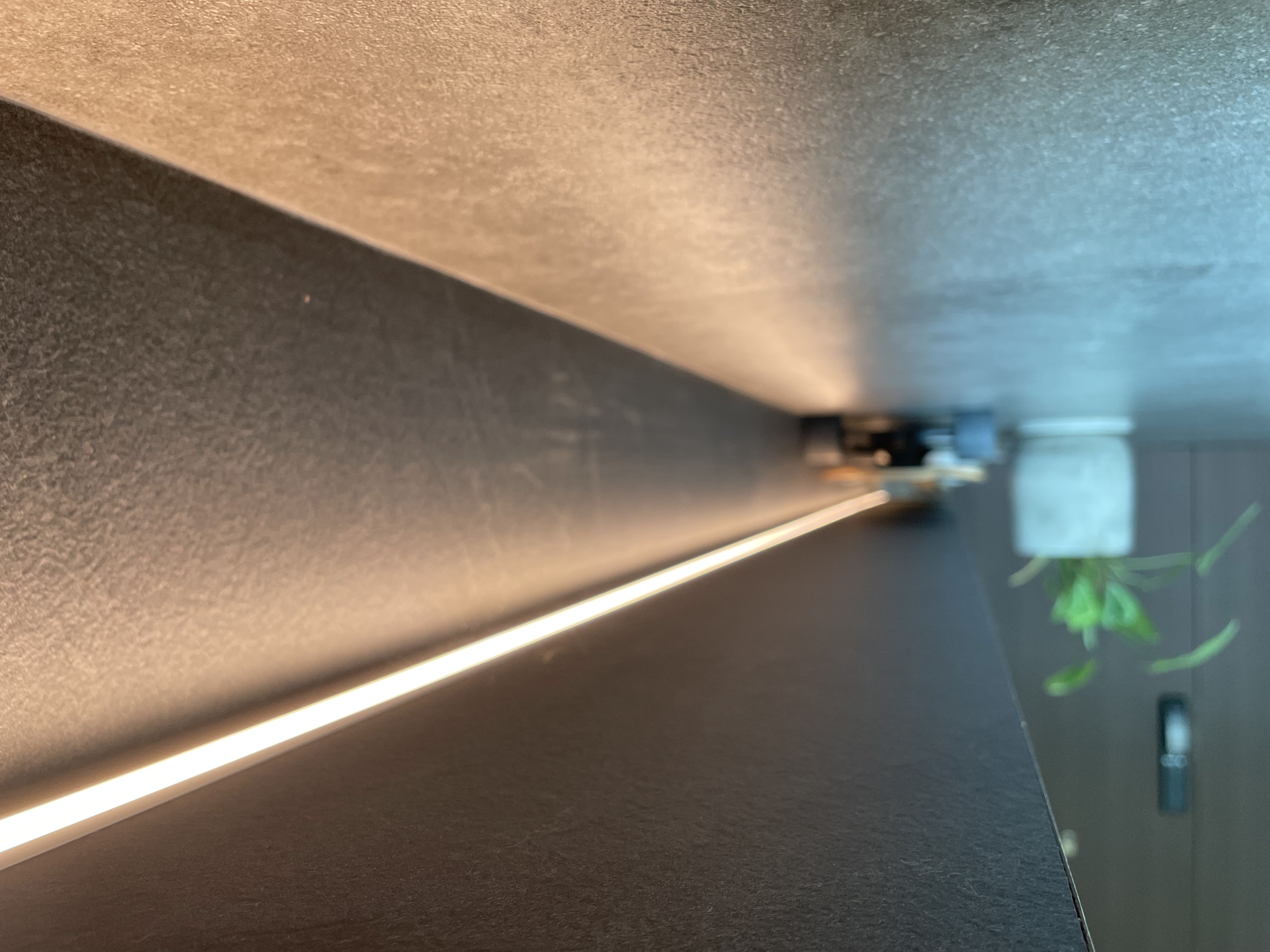 That moment when you open your door, you know you are home. - LED strip lighting, sleek modern design, minimalist aesthetic